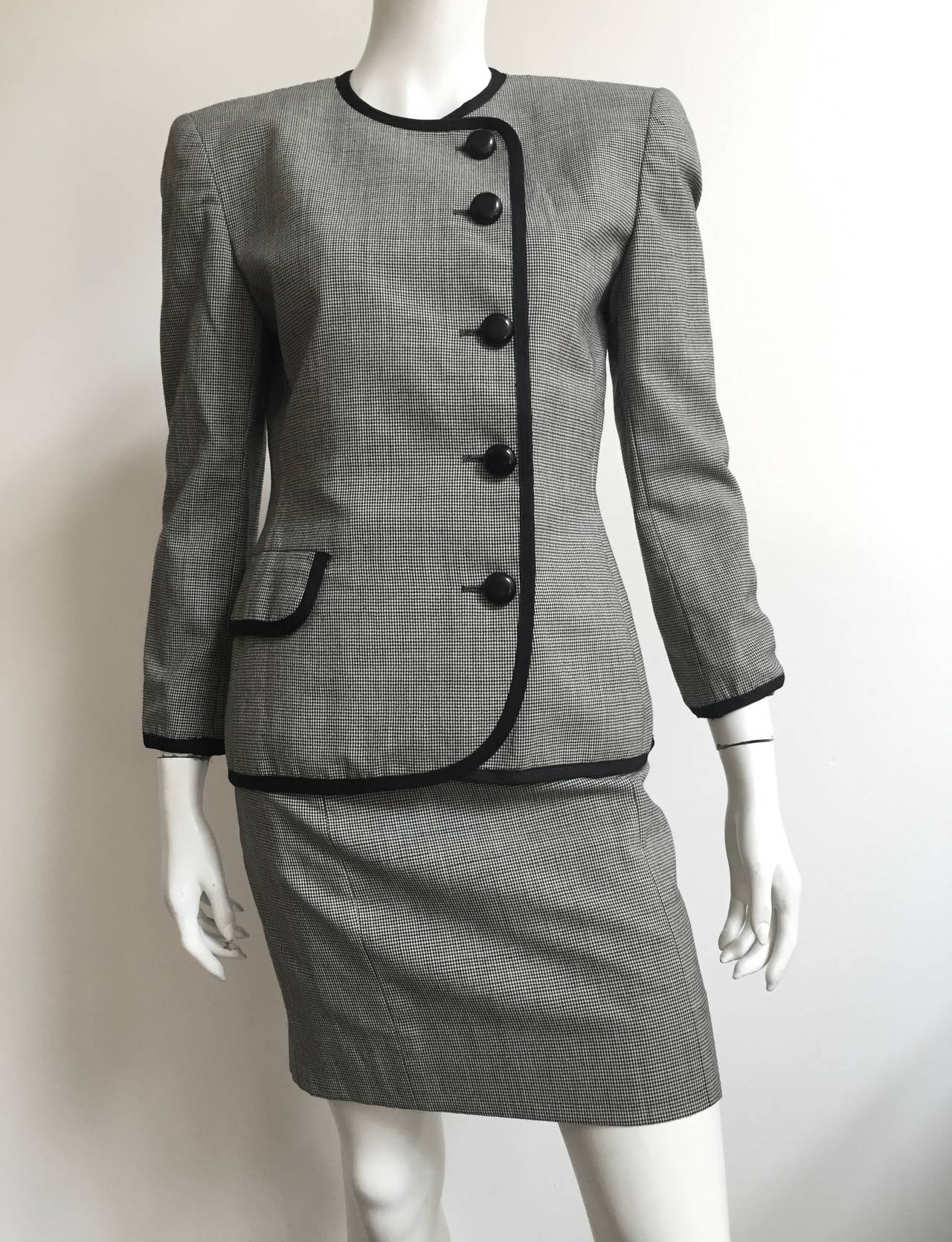 Christian Dior 1980s wool black & white houndstooth pattern 3 piece; skirt - jacket - scarf, is a USA size 4. Ladies please grab your tape measure so you can properly measure your bust, waist & hips to make certain this gorgeous piece will fit your