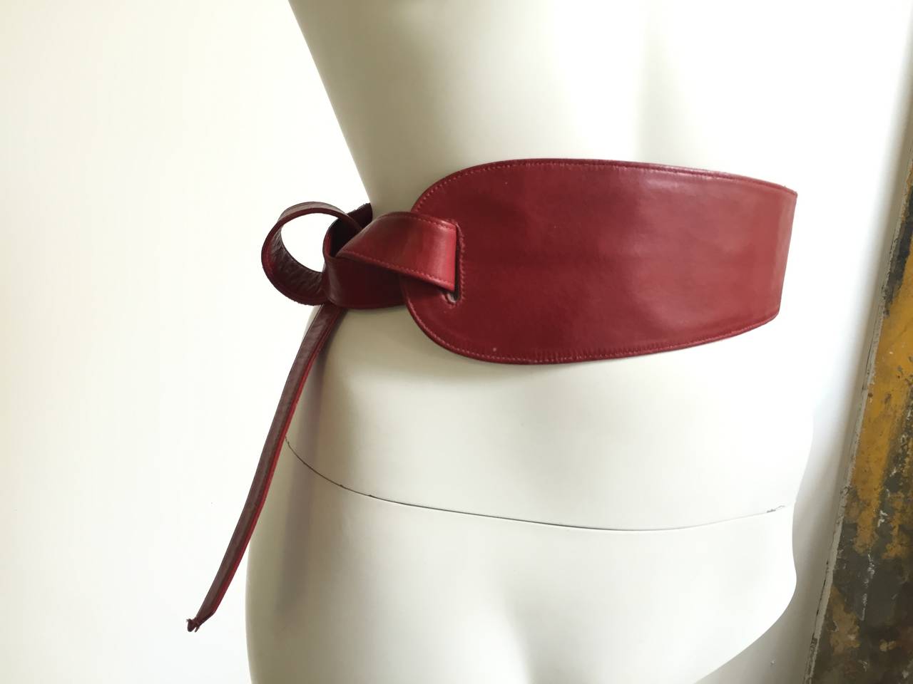 Alexis Kirk 80s red leather tie belt.