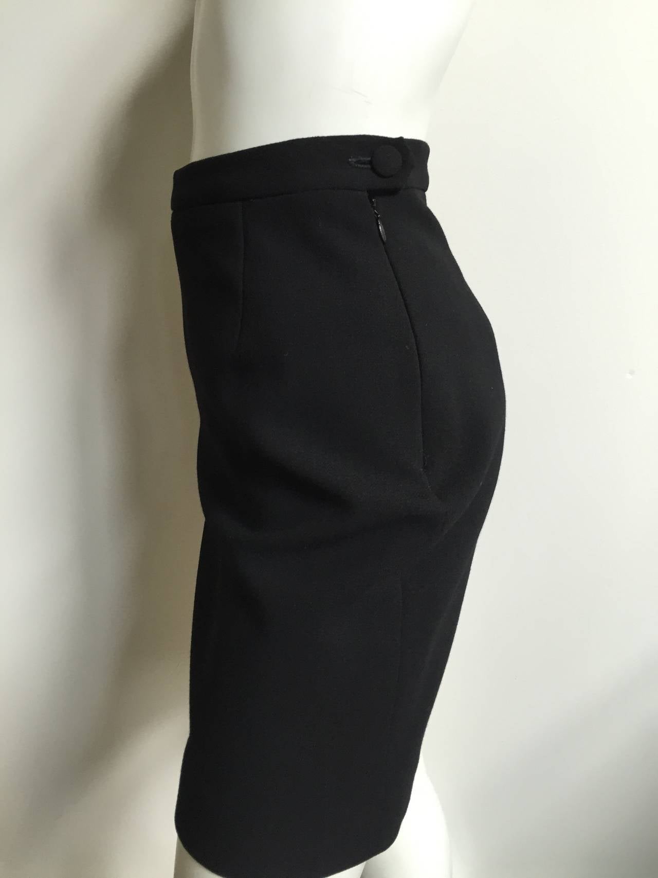 Moschino Cheap and Chic 1980s short black wool skirt is an original vintage size 14 but fits like a modern USA size 6.   Please see & use the measurements I provide you so you can make sure this will fit you and the paparazzi will love you for it.