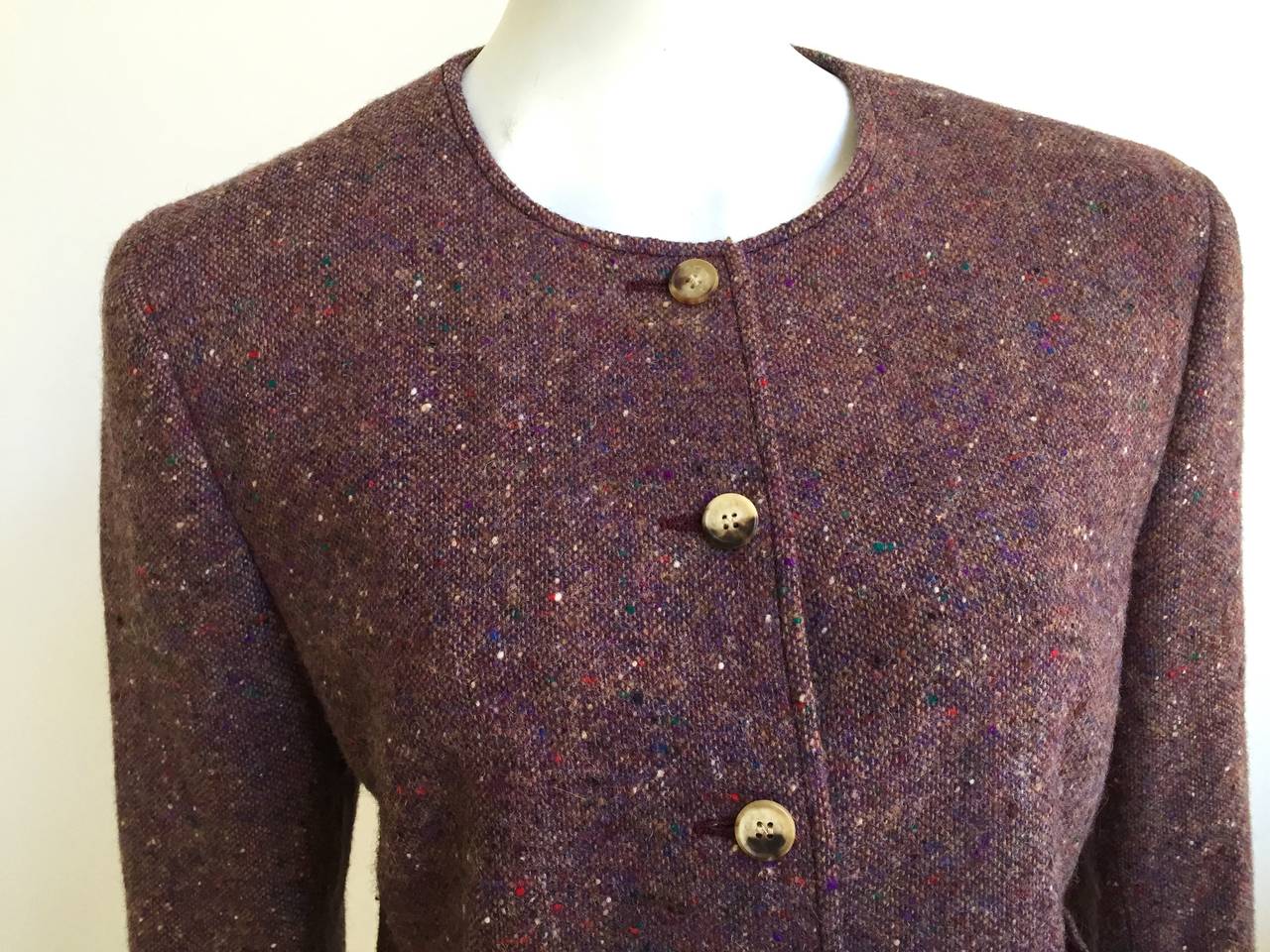 Celine 1960s tweed collarless jacket with 4 buttons & front pockets is a vintage size 46 but fits like a modern USA size 8.  Please see & use measurements below so that you properly measure your body to make certain this will fit you to perfection.