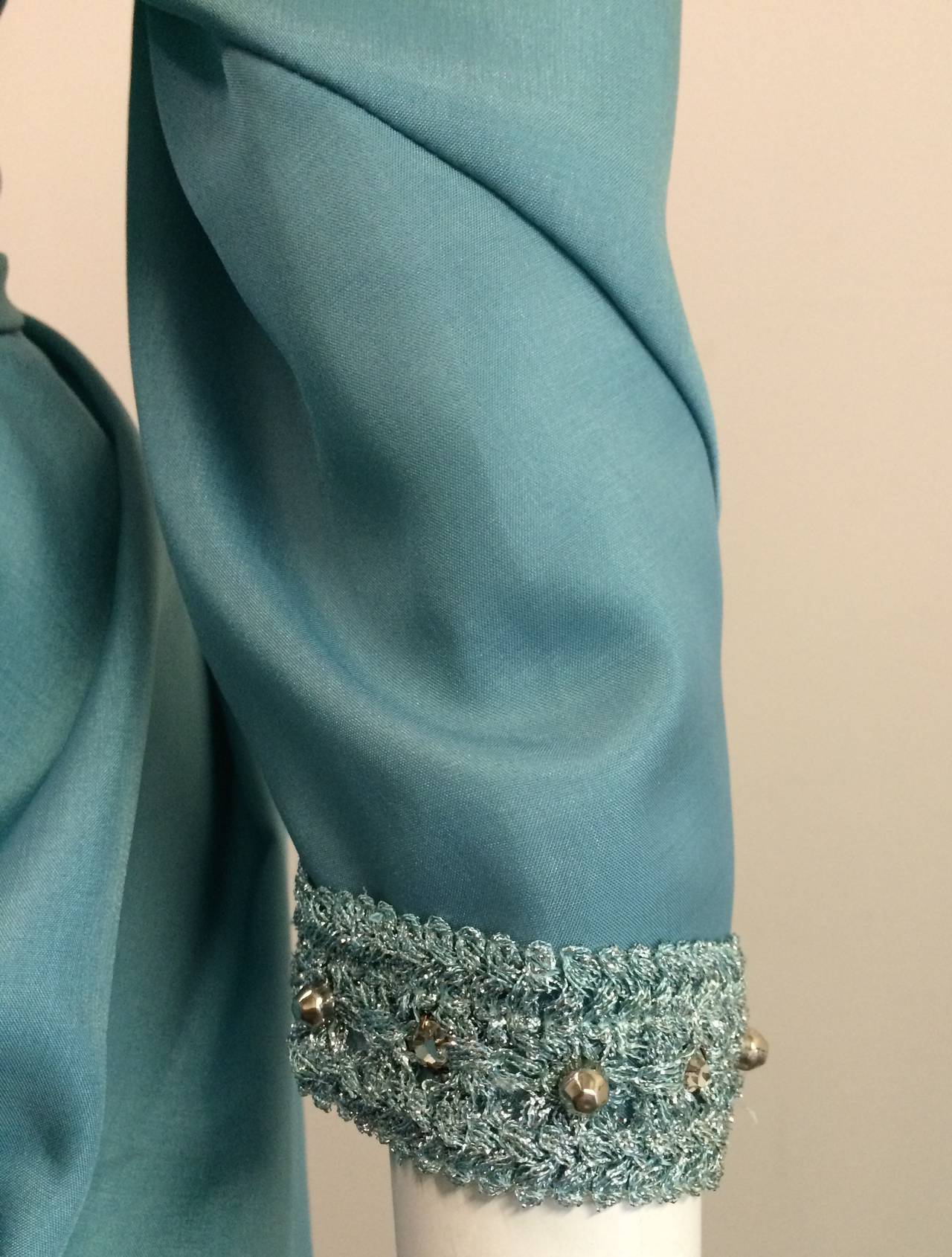Women's Halston 70s caftan / gown with beading trim and sash.