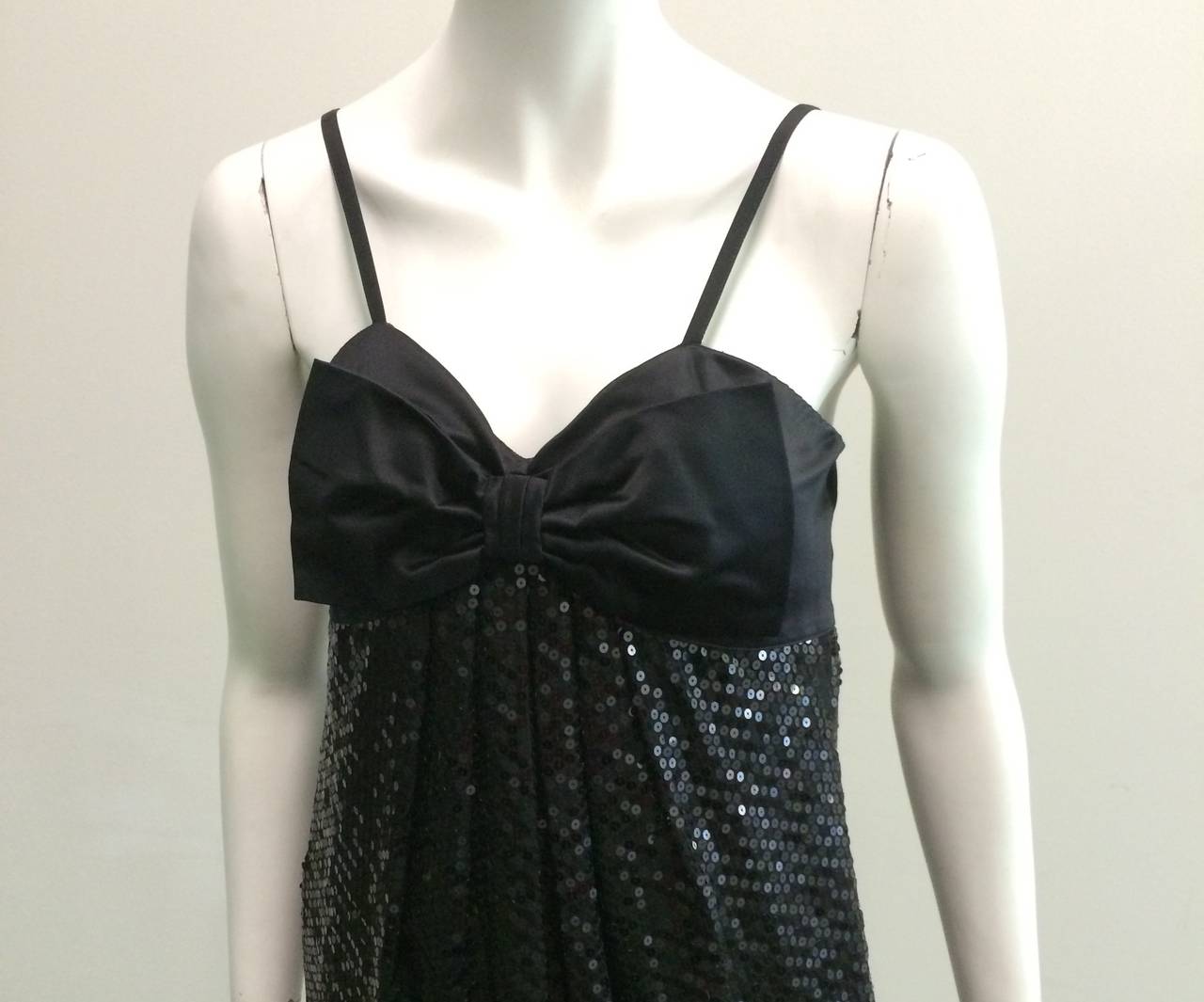 Louis Feraud 1980s black sequin cocktail dress with bow original size is 10 but fits like a modern USA size 6. Ladies please grab your tape measure so you can measure your bust, waist & hips to make certain this gorgeous piece will fit your lovely