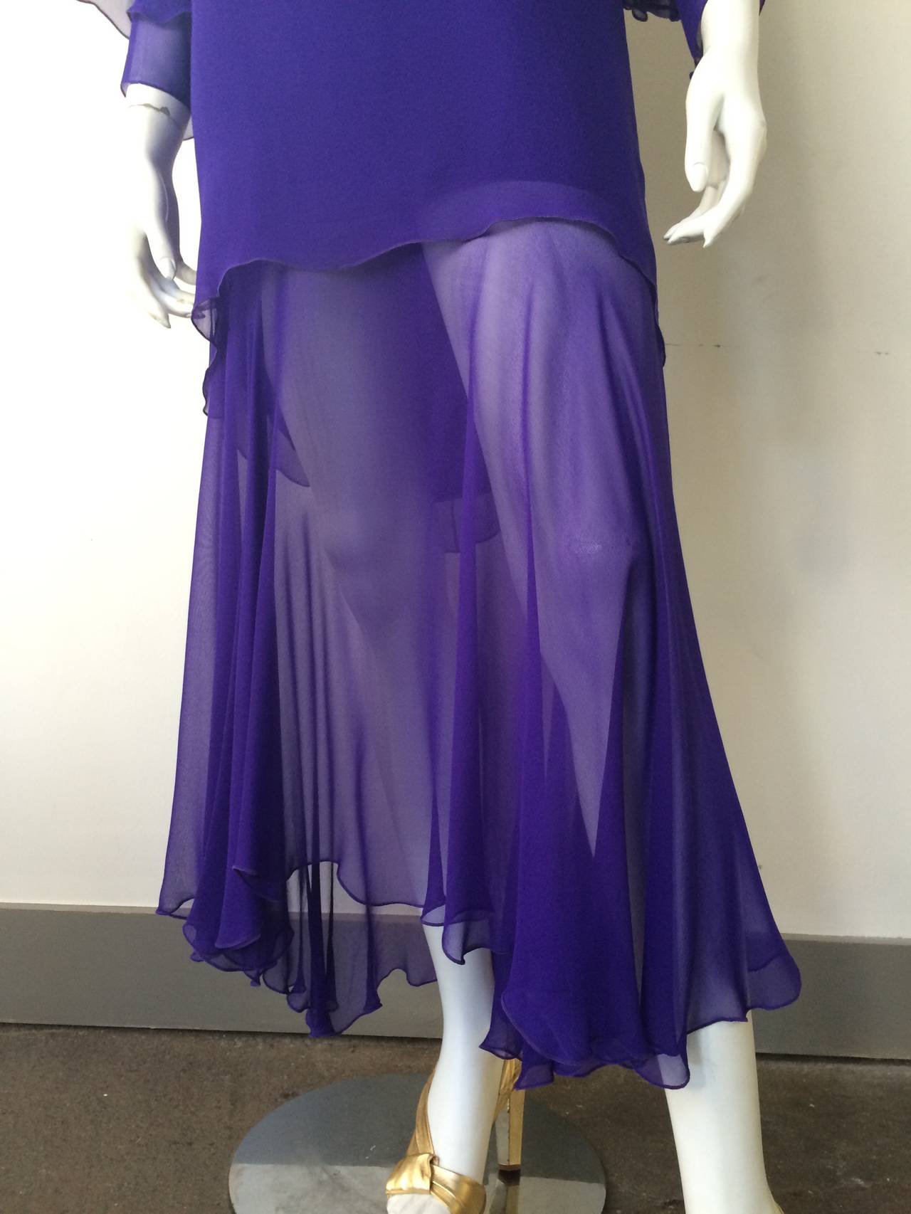 Holly Harp 80s silk layered royal purple dress is size p but fits like a 6, please see measurements. The flowing layered top part with the dolman sleeves and sheer bottom half of dress, makes this dress timeless.  Holly Harp was a fashion designer
