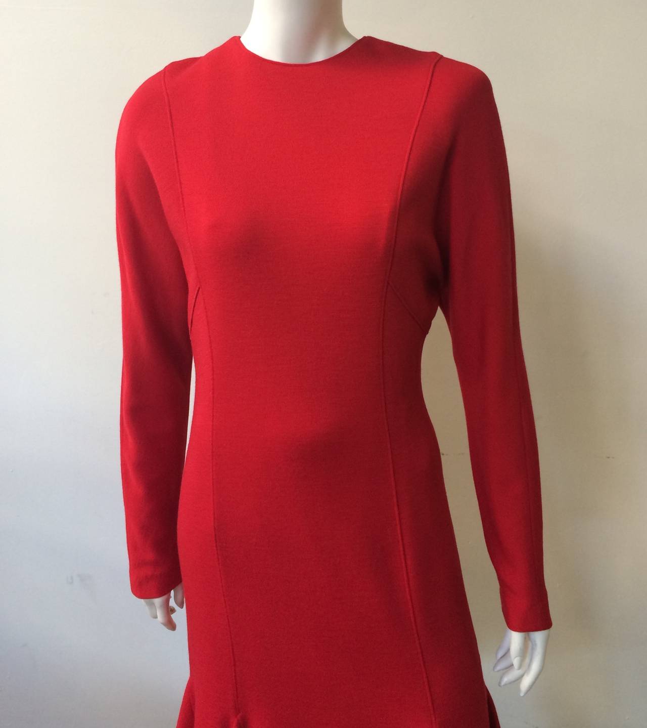 Hanae Mori Boutique for Neiman Marcus 1980s red wool jersey dress with 7 fabric covered buttons on back of dress is a size 6. Ladies please use your measuring tape so you can properly measure your bust, waist & hips for this lovely vintage piece.
