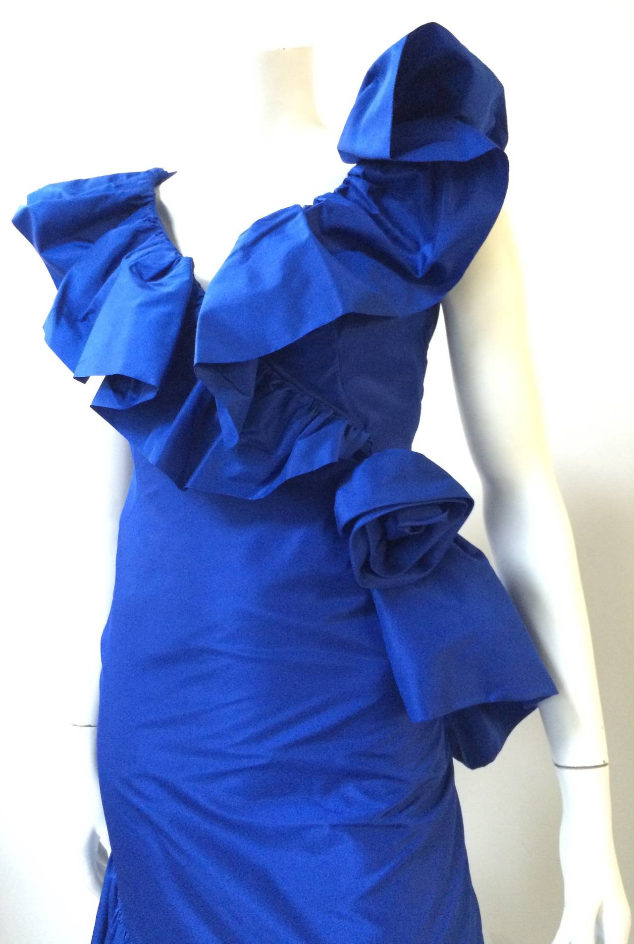 Mignon for Neiman Marcus 80s ruffled & layered cobalt blue taffeta gown is a size 6 but please see measurements. This ruffled v-neck collar gown with a rose on the side with spiral layered bottom is timeless. Designed by Dorothy Farbo for Mignon