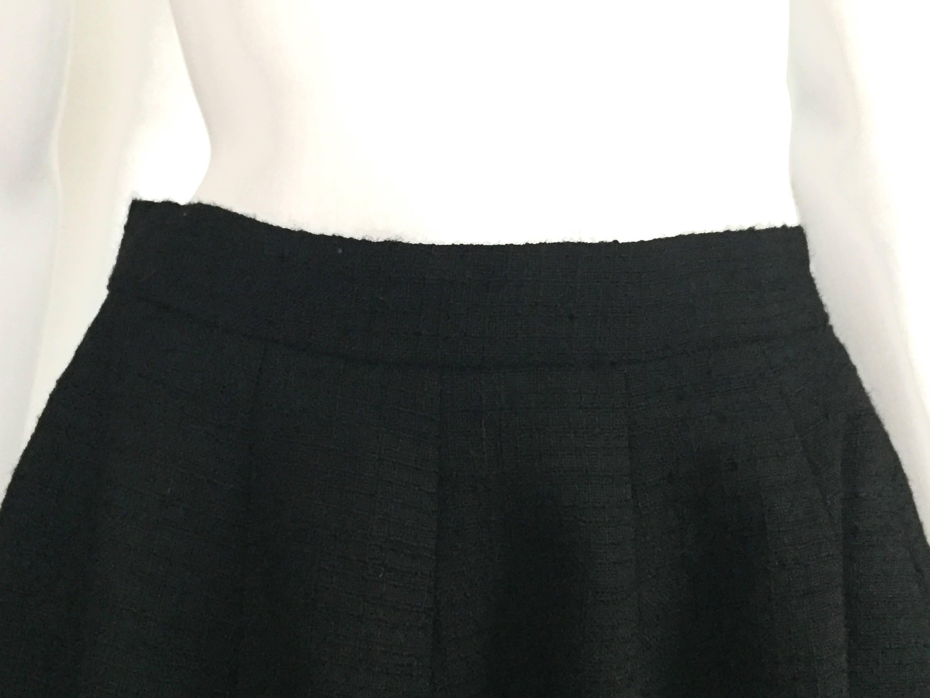 Norman Norell 1957 black wool flare skirt size 6 / 8.  In Excellent Condition For Sale In Atlanta, GA