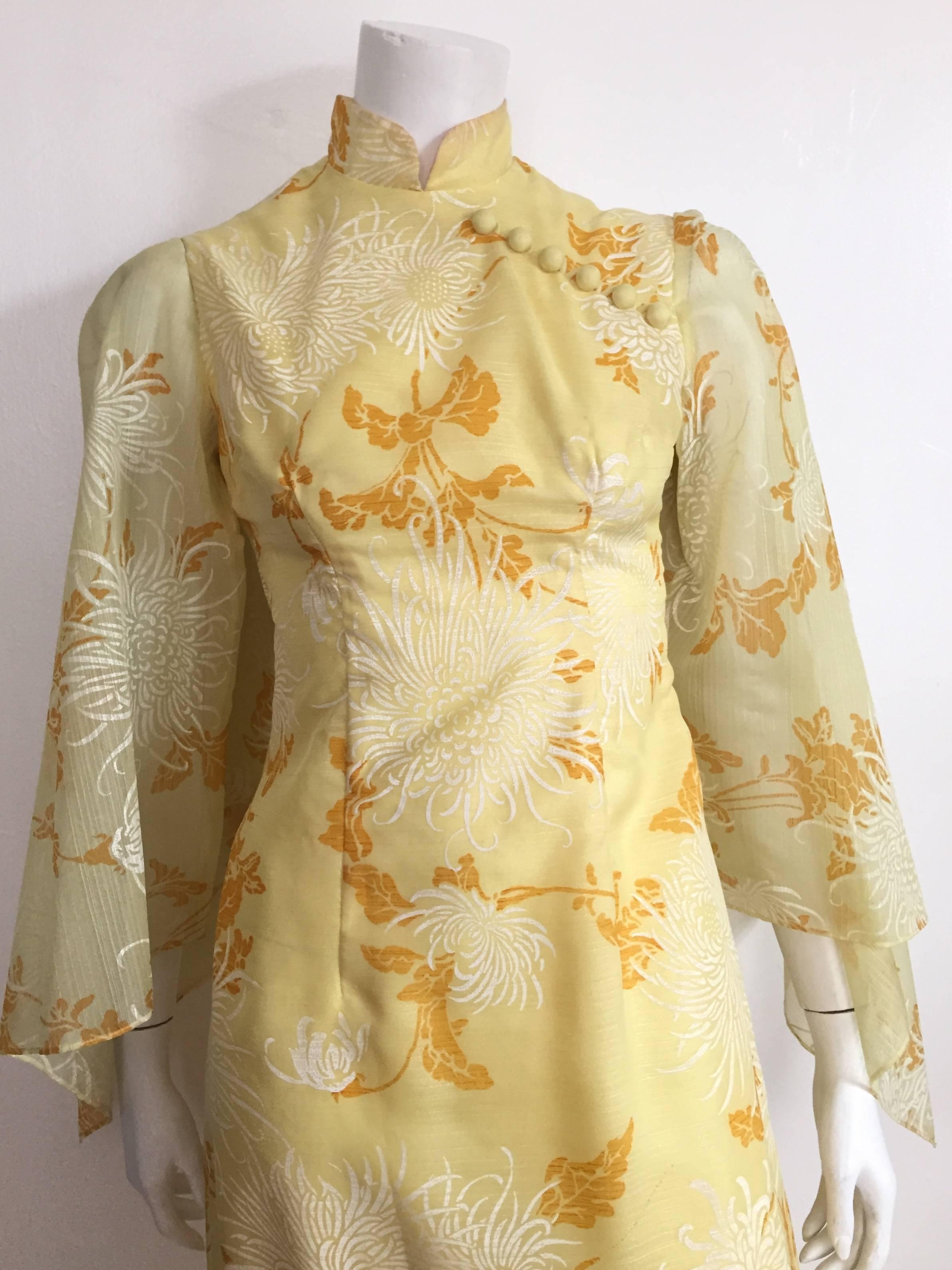 Alfred Shaheen 1970s yellow floral maxi gown is a size 4. 
Flowing handkerchief sleeves. This red carpet ready gown will turn heads in your direction. 
Measurements are:
 32" bust
27" waist
31" hips
30" sleeves
25.5" flat