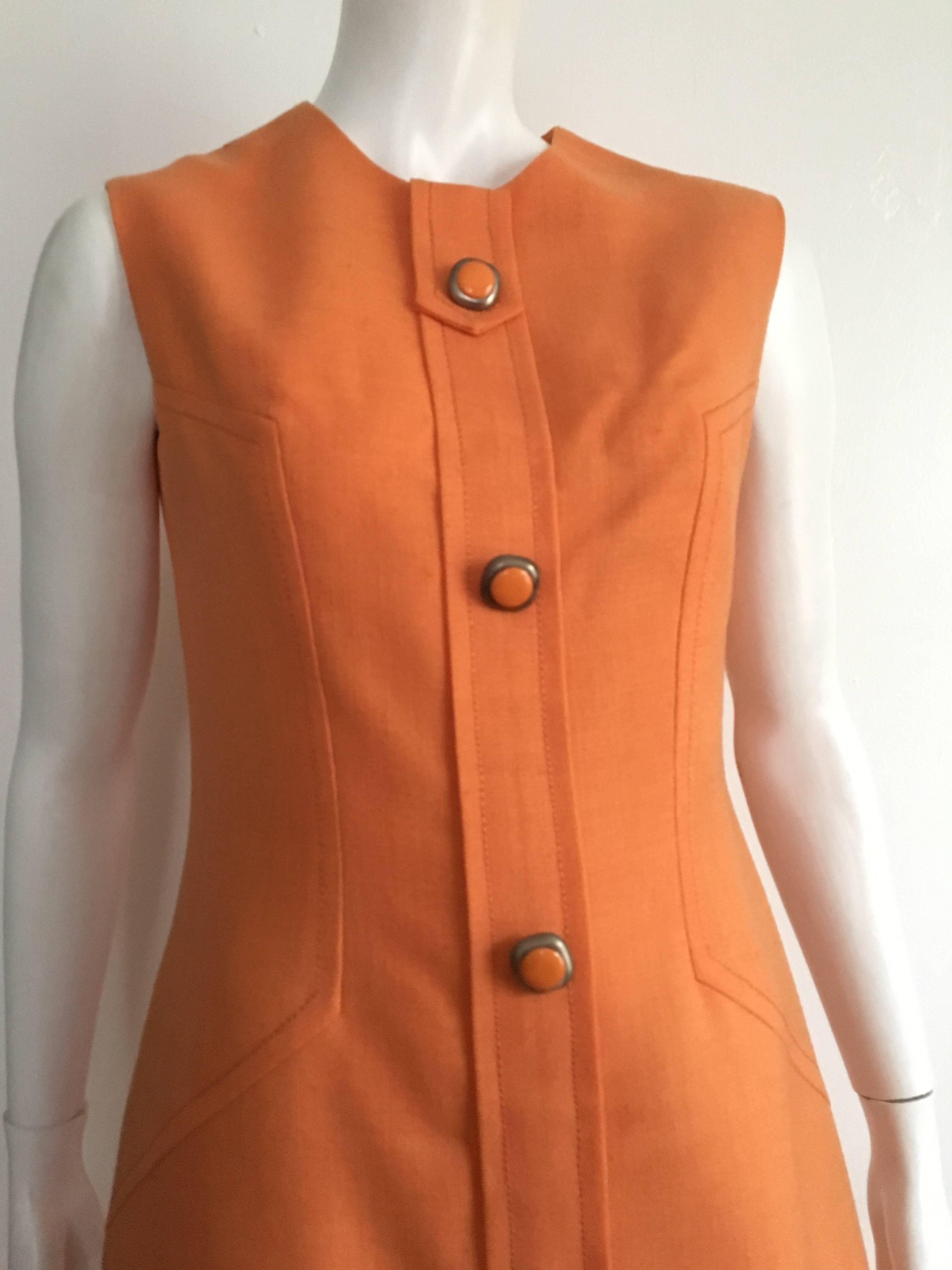 Anne Sorrente 1960s orange nubby wool sleeveless dress will fit a size 8 but please see & use the measurements listed below so that you can properly measure your body to make certain this vintage treasure will fit you to perfection. Dress is lined. 