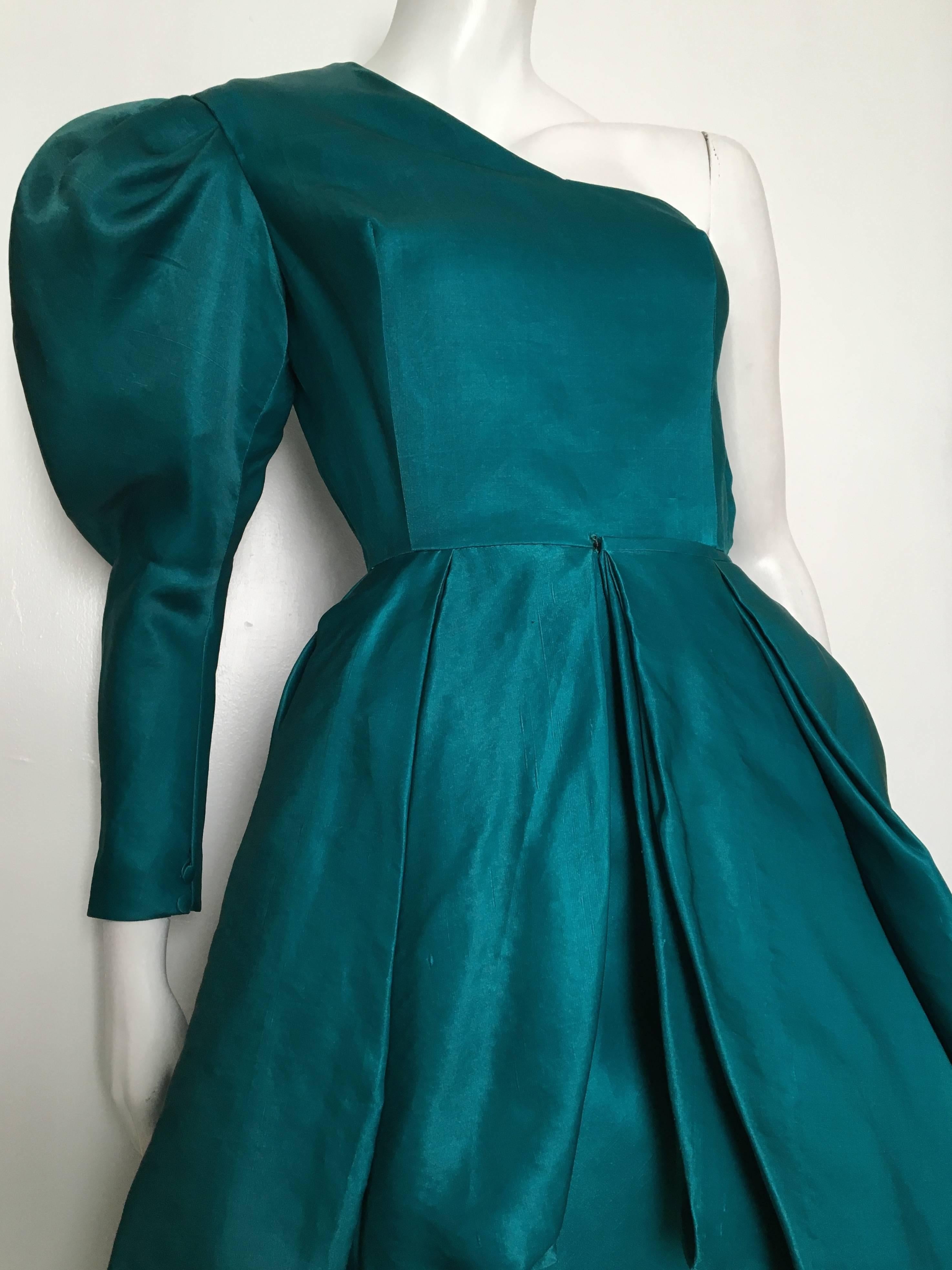 Tan Giudicelli 1980s teal silk dramatic one shoulder evening gown is a vintage French size 38 but fits like a modern USA size 4.  Please see the measurements listed below so you can properly measure your lovely body to make certain this gown will