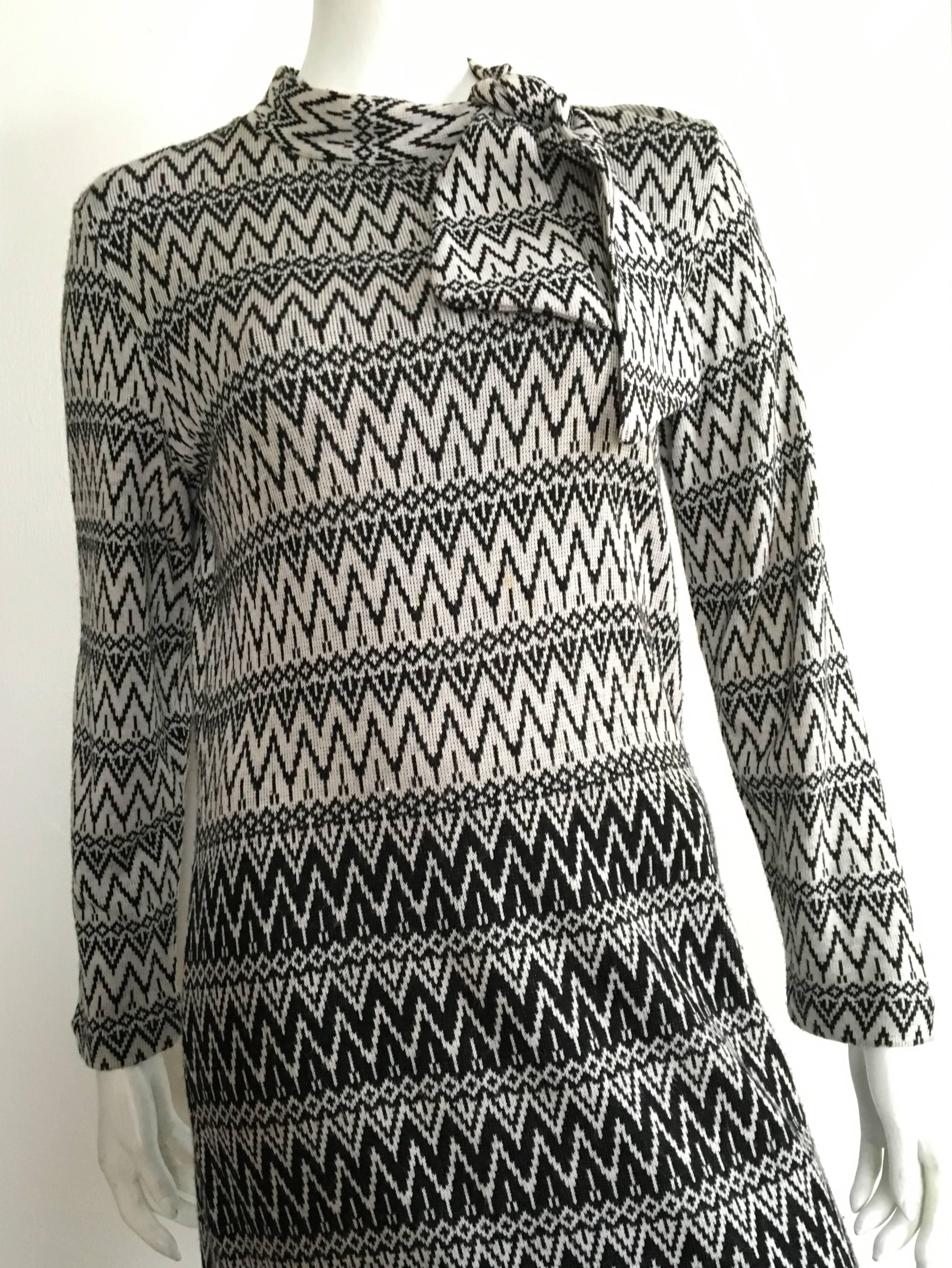 Susan Small 1970s casual chevron pattern long acrylic knit maxi dress is a vintage size 14 but fits like a modern USA size 6 / 8.  Please see & use the measurements listed below so you can properly measure your lovely body to make certain that this