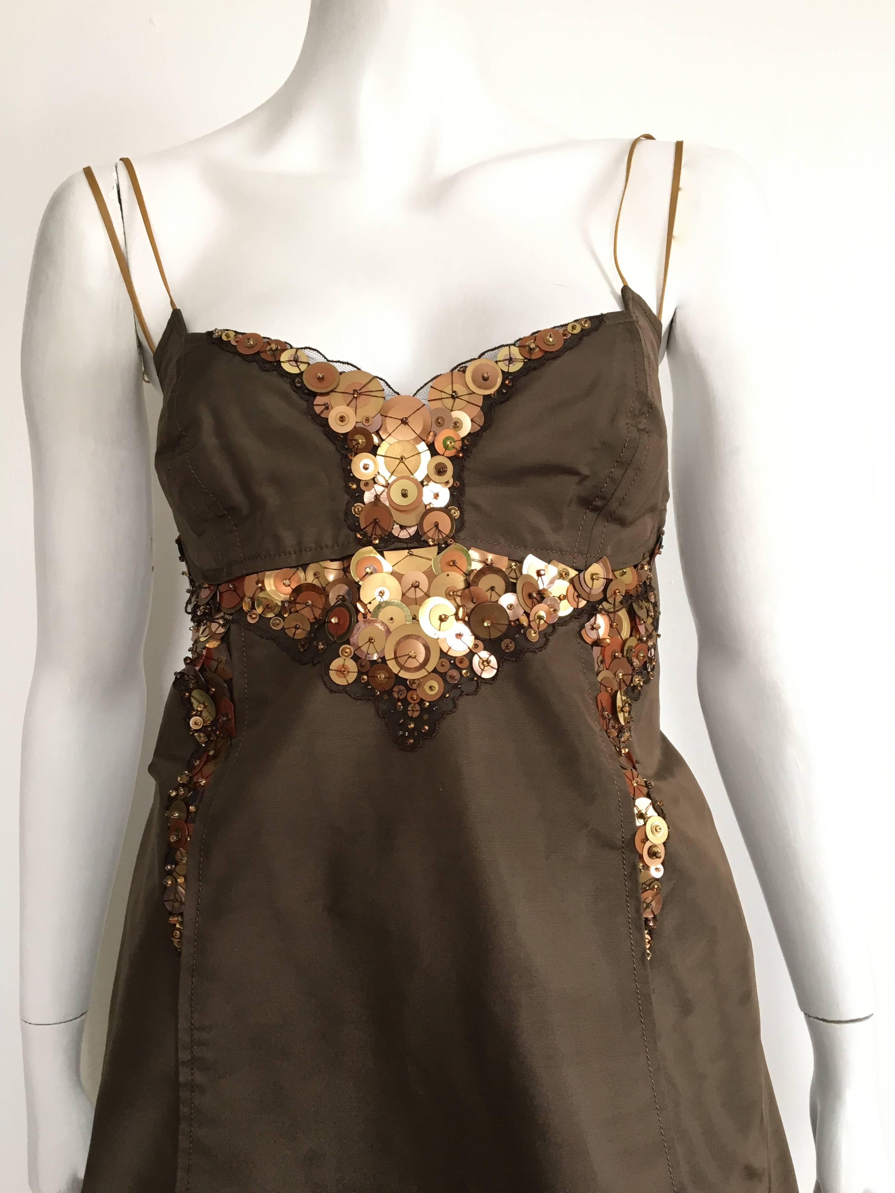 Carolina Herrera brown silk taffeta sequin & beaded trim cocktail dress is a size 10.  Please see & use measurements below so you can properly measure your lovely body so you know this dress will fit the way Carolina wanted it to.  This