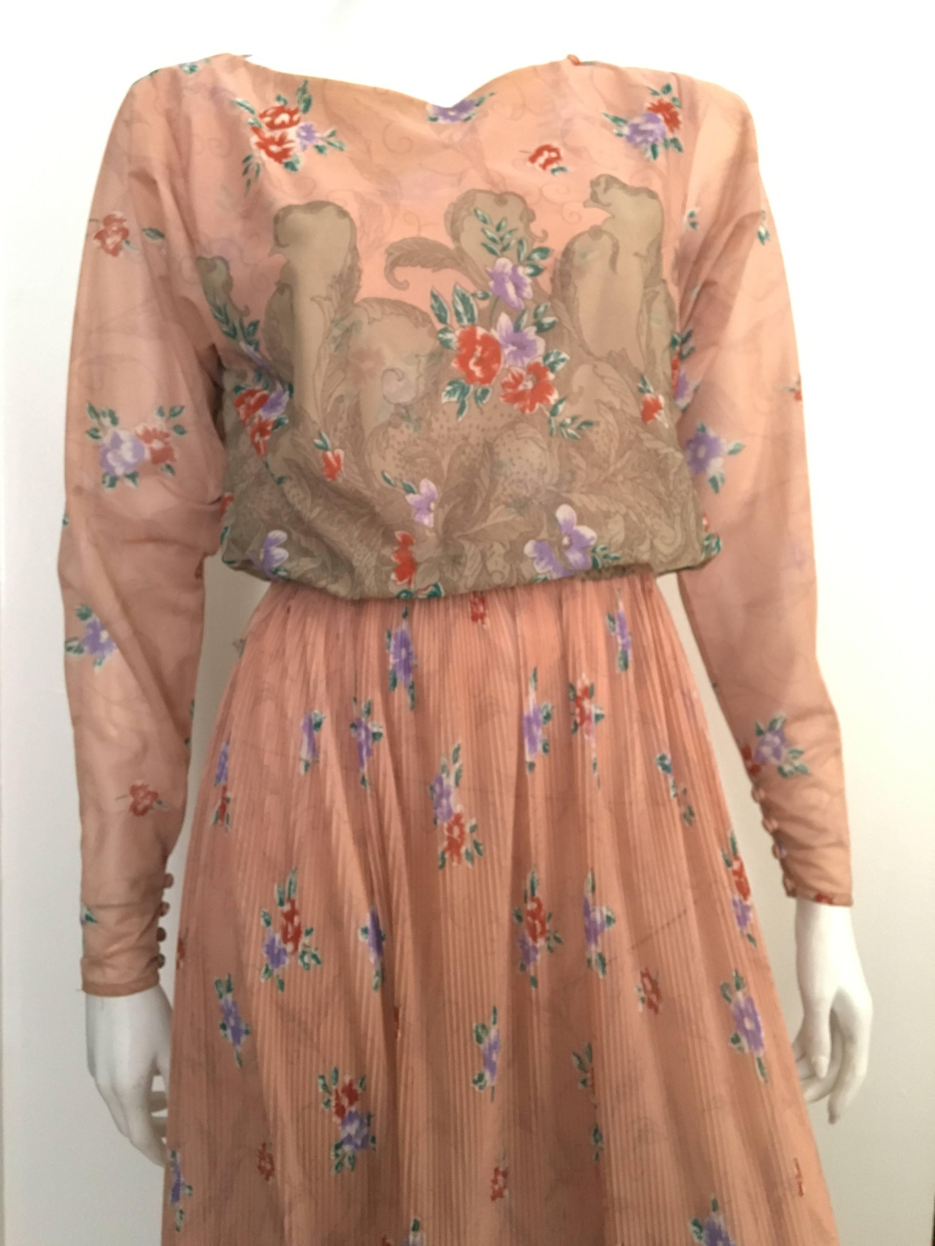 Neiman Marcus 1970s peach floral Asian inspired dress is a vintage size 7-8 but fits like a modern USA size 4.  Ladies please use your tape measure to properly measure your lovely body so you know for certain this will fit to perfection. Top part of