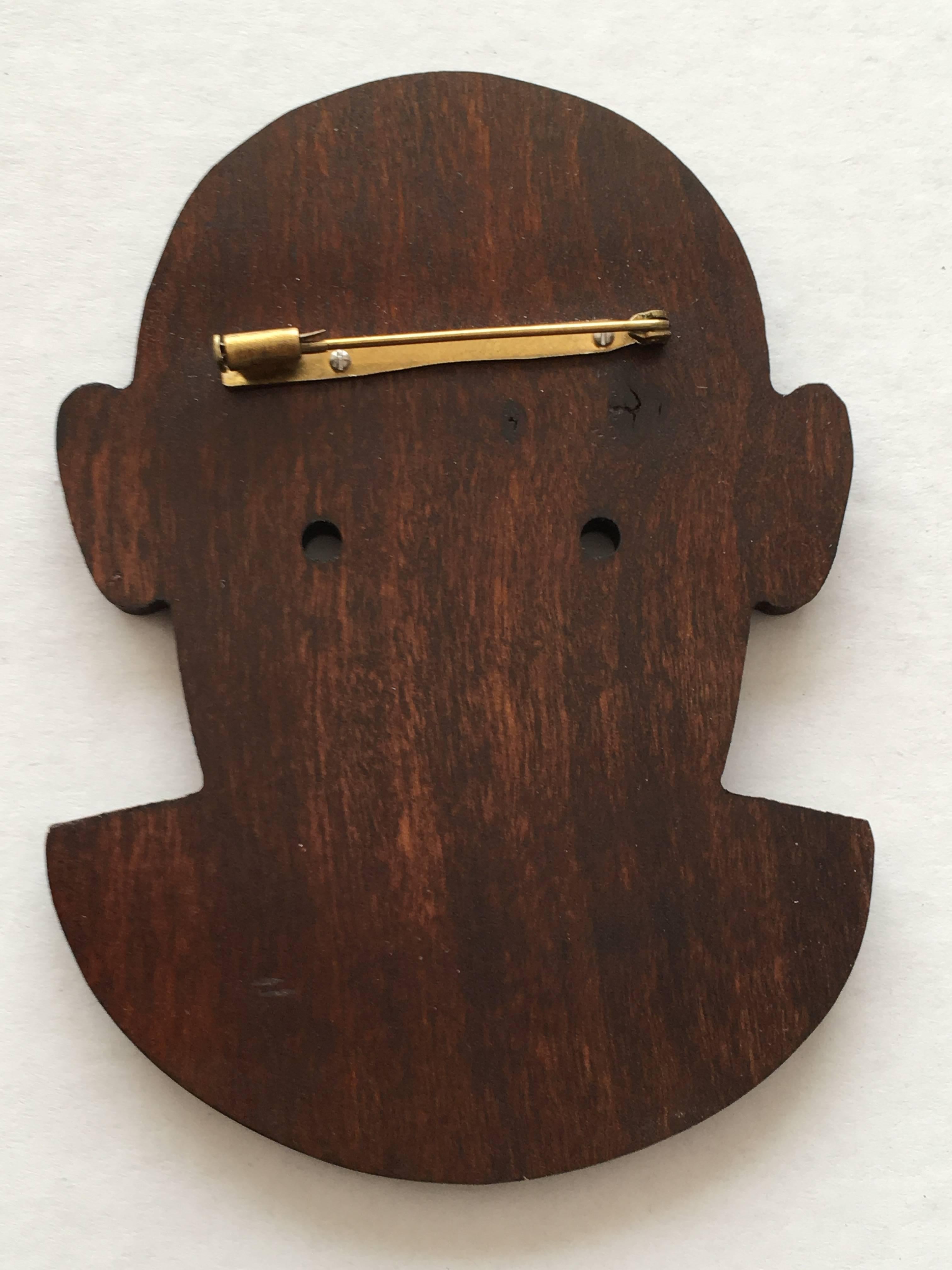 Women's or Men's Patrick Kelly Paris 1989 African Wooden Face Cutout Pin.  For Sale