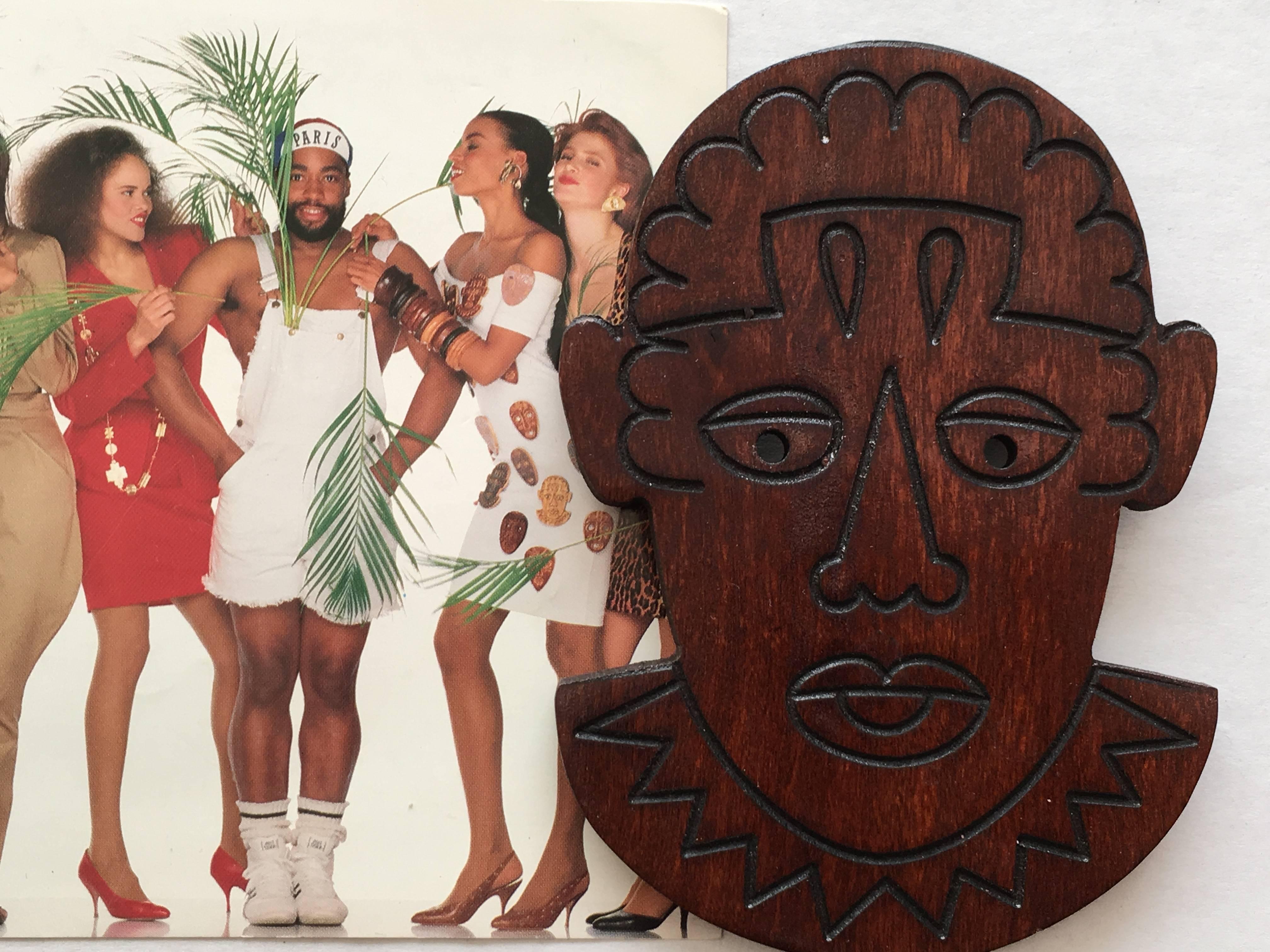 Artist Patrick Kelly Paris 1989 African Wooden Face Cutout Pin.  For Sale