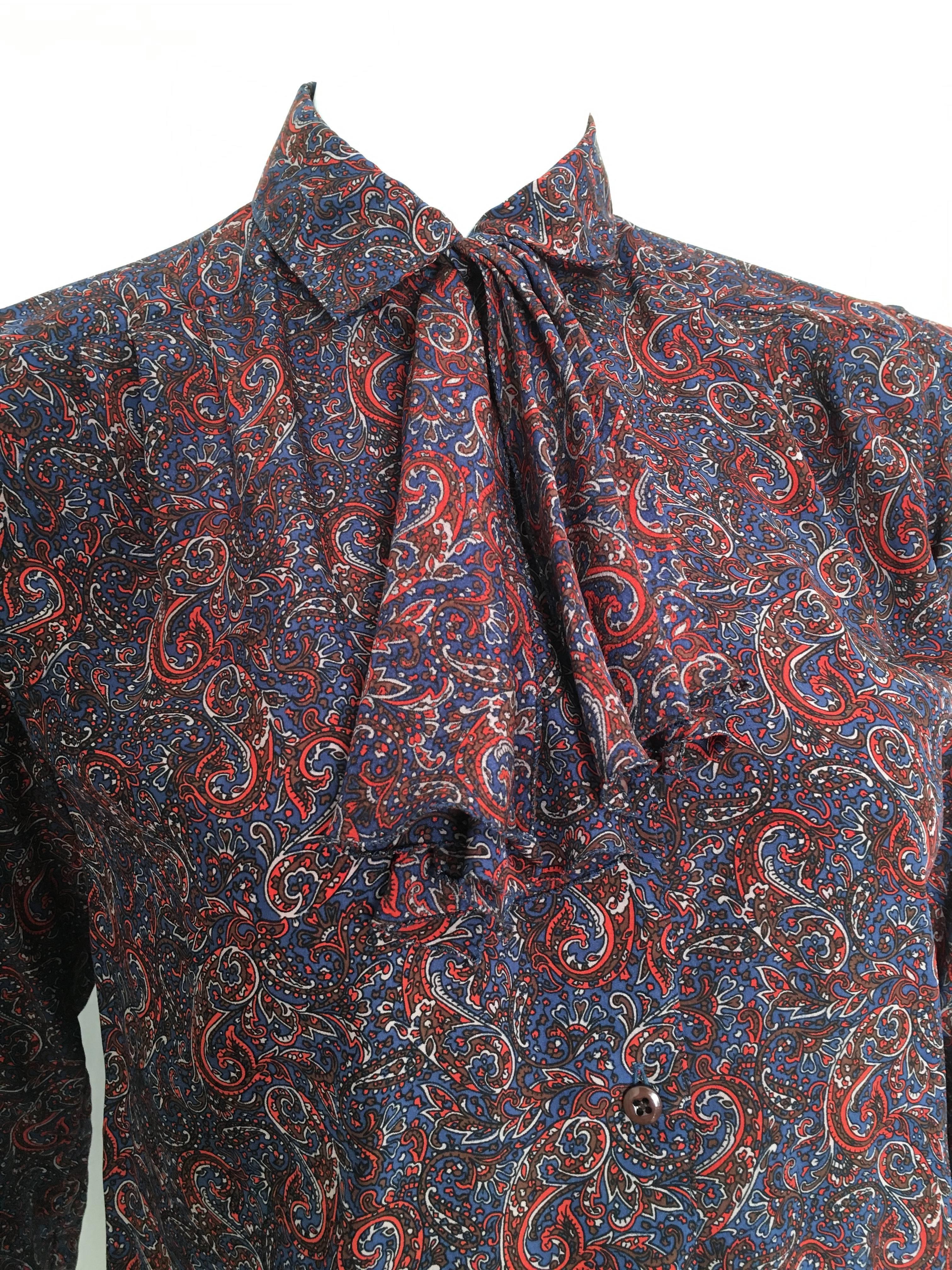 Salvatore Ferragamo 1980s silk paisley print button up blouse with ruffled neck tied is a vintage size 8 but fits like a modern USA size 6.  Ladies please use your tape measure to properly measure your lovely body to make certain this will indeed