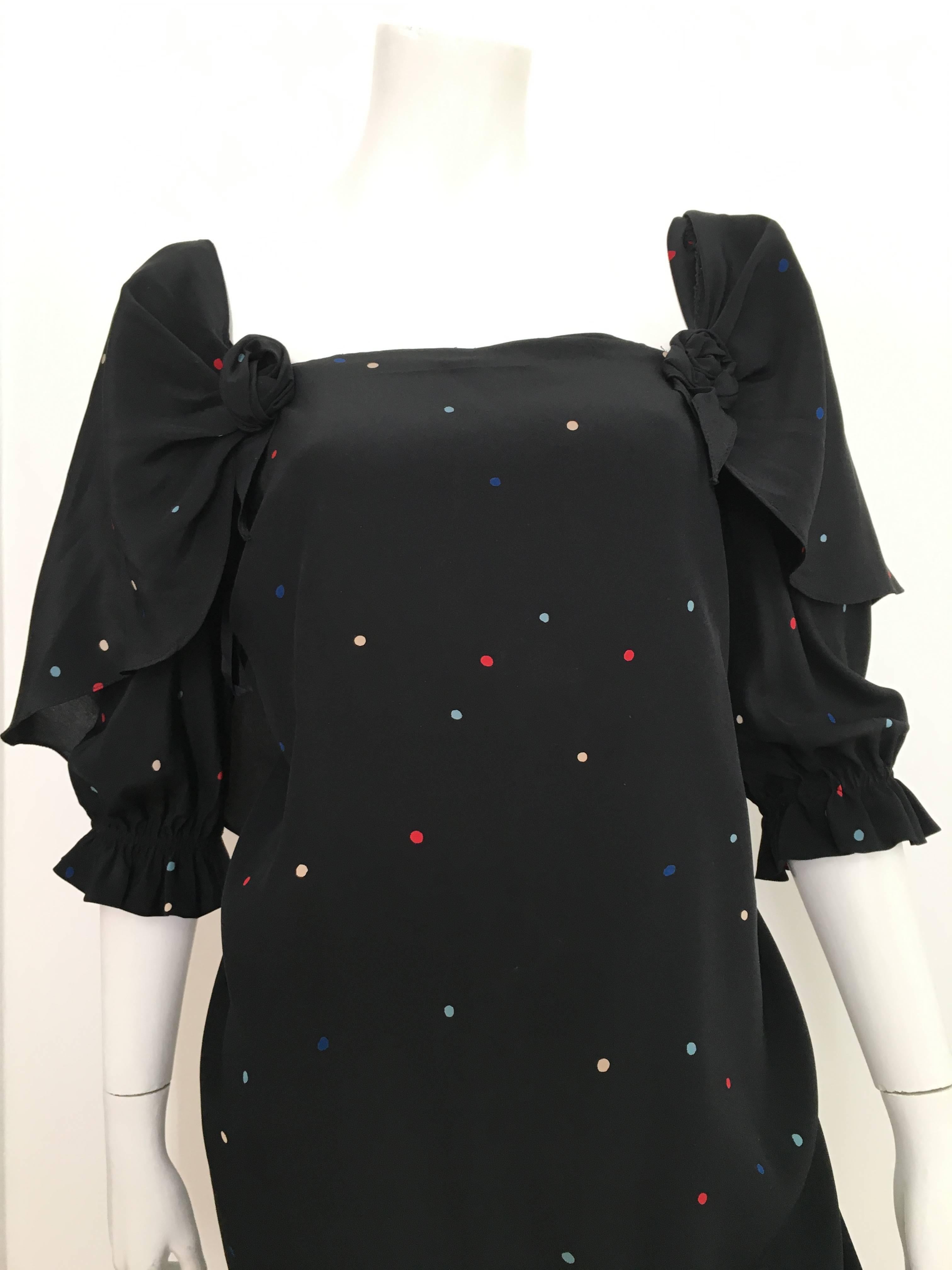 Halston 1970s black silk polka dot dress is a size 6 /8.  Ladies please use your measuring tape so that you can properly measure your bust, waist & hips to make certain this will fit your lovely body the way Halston wanted it to. This dress is