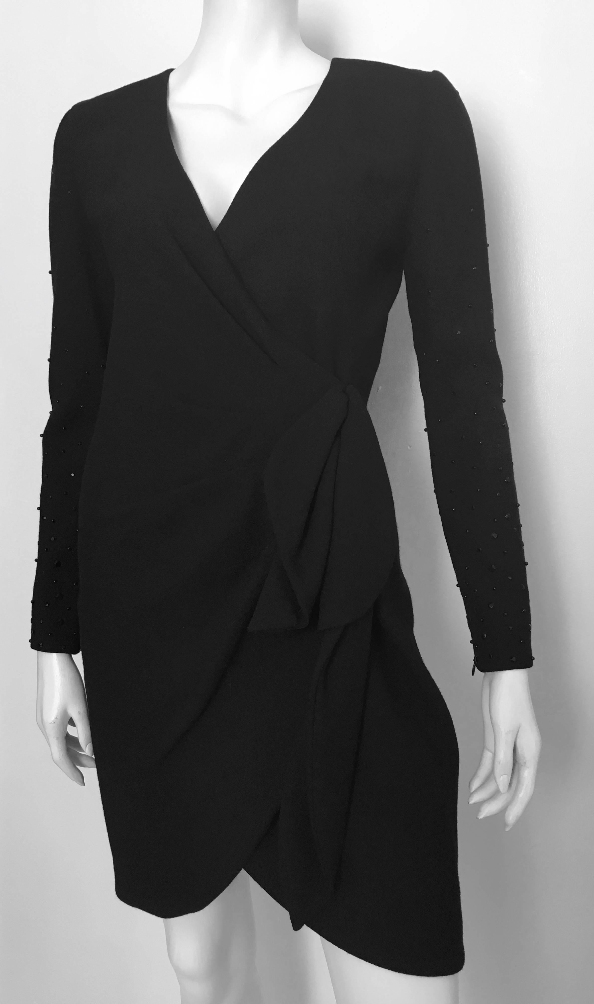 Carolina Herrera for Neiman Marcus 1990 black wool faux wrap cocktail dress with beaded zipper sleeves is a size 6.  Ladies please use your measuring tape so you can properly measure that lovely body of yours to make certain this will fit to