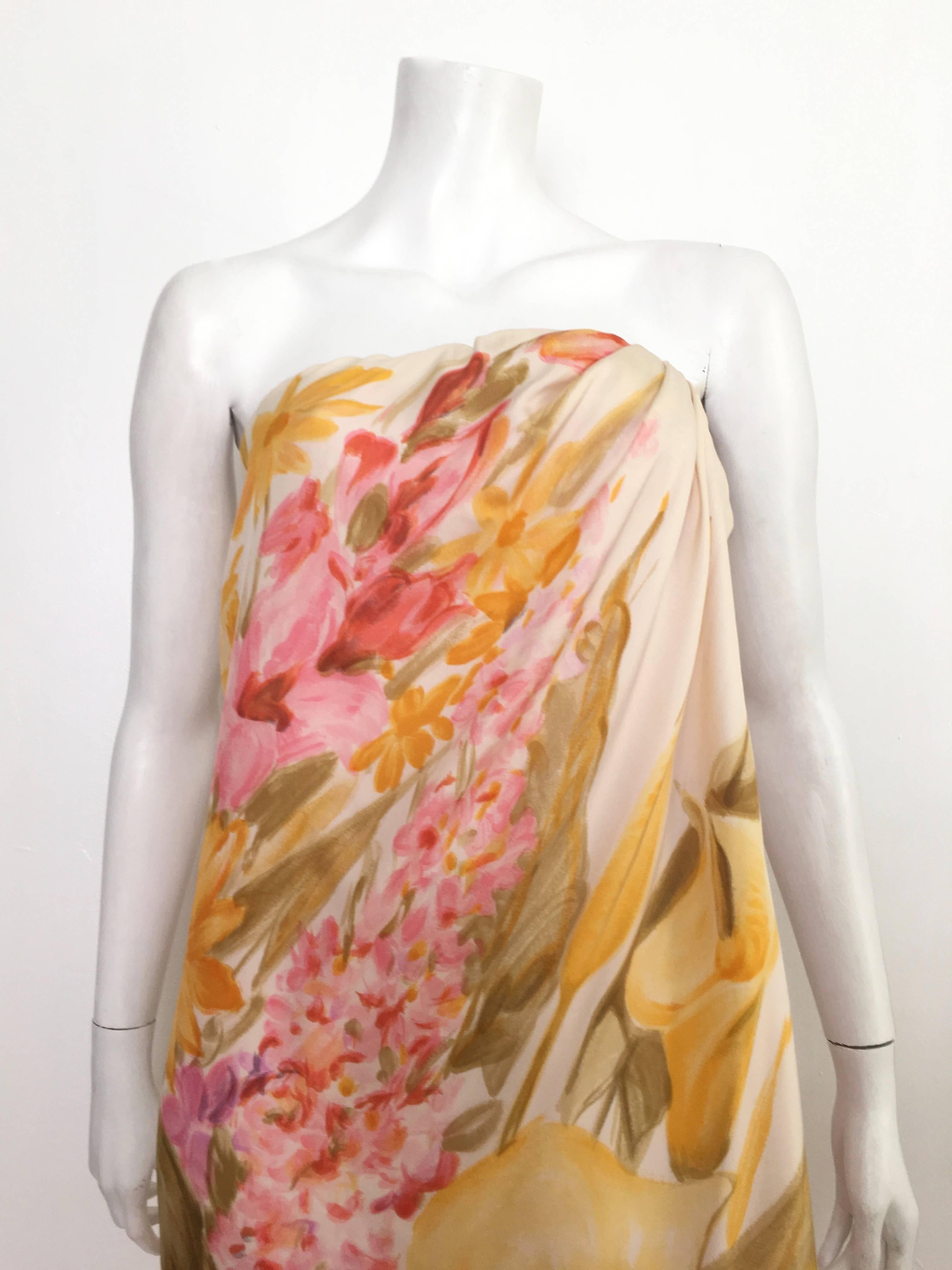 Bill Blass for Maurice Rentner 1960s strapless silk floral gown is a size 4. Ladies please use your measuring tape to properly measure your bust, waist & hips to make sure this vintage gown will fit your lovely body. Floral silk pattern overlay on
