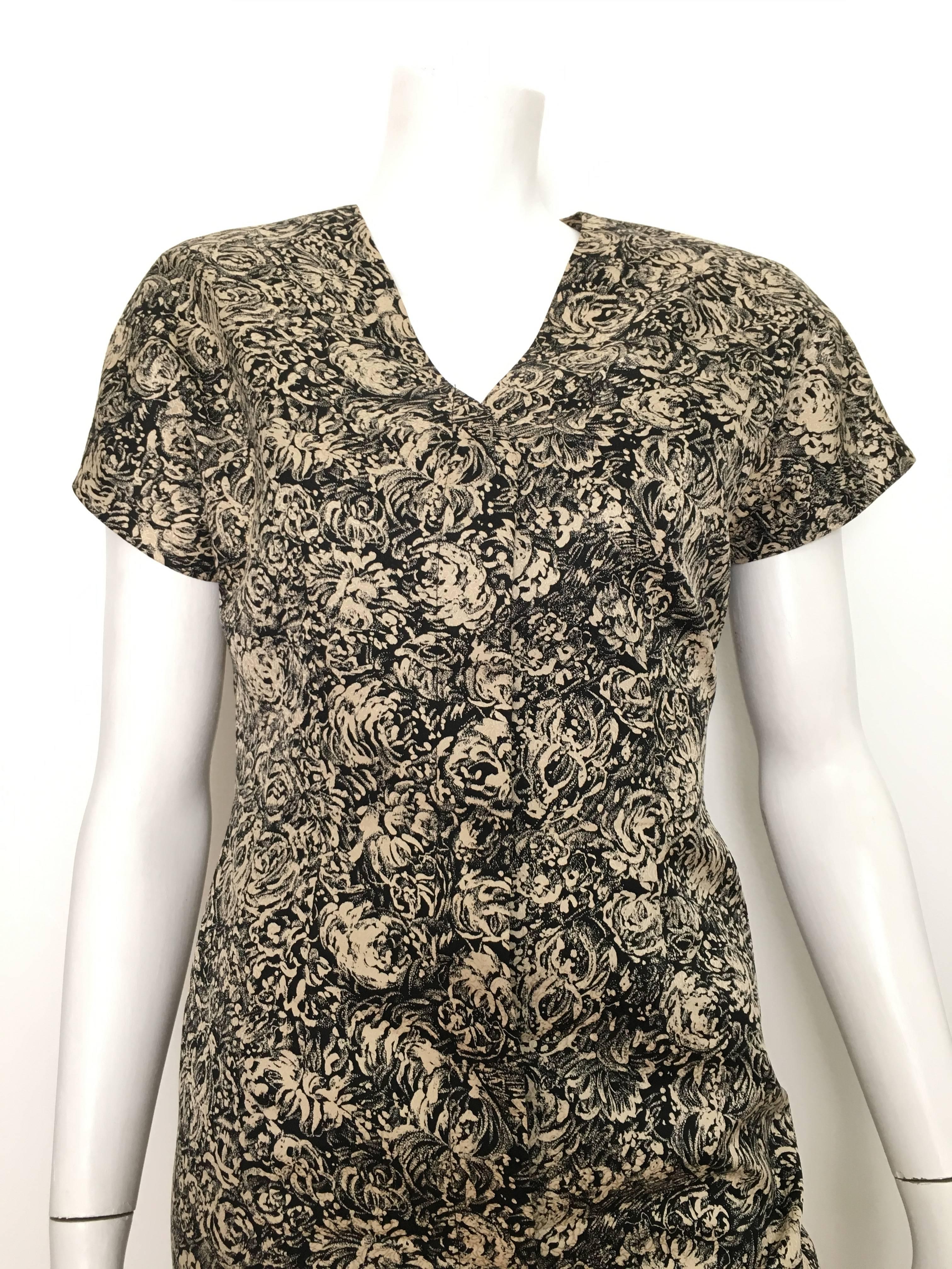 Bill Blass 1980s silk button up short sleeve dress with rose pattern is a size 6. Ladies please use your measuring tape so you can properly measure your bust, waist &  hips to make sure this vintage treasure will fit your lovely body to perfection. 
