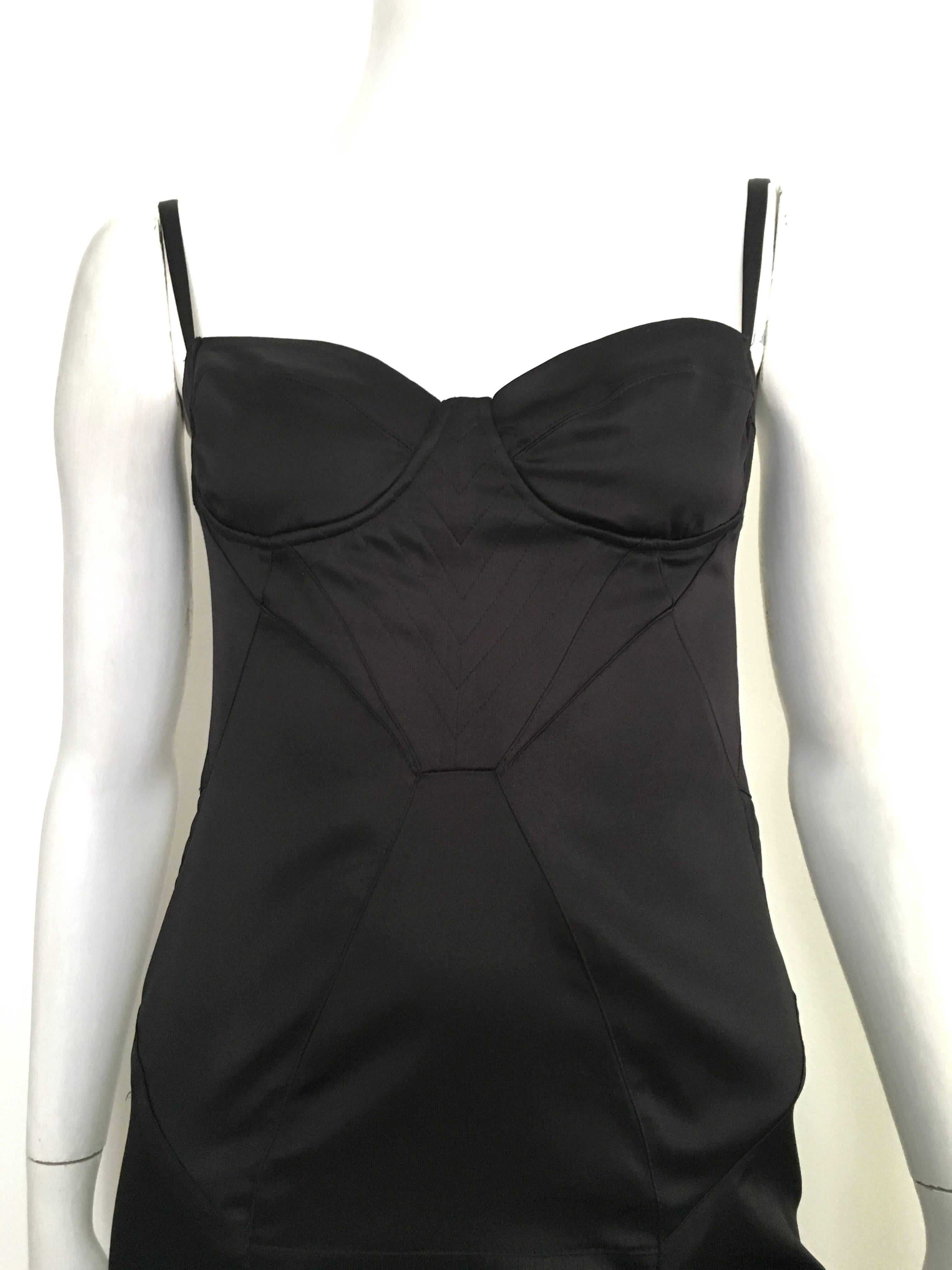 Just Cavalli by Roberto Cavalli black stretch dress is an Italian size 44 but fits like a USA size 4.  Ladies please use your measuring tape so you can properly measure your lovely body so you know this will fit you to perfection. Interior wire