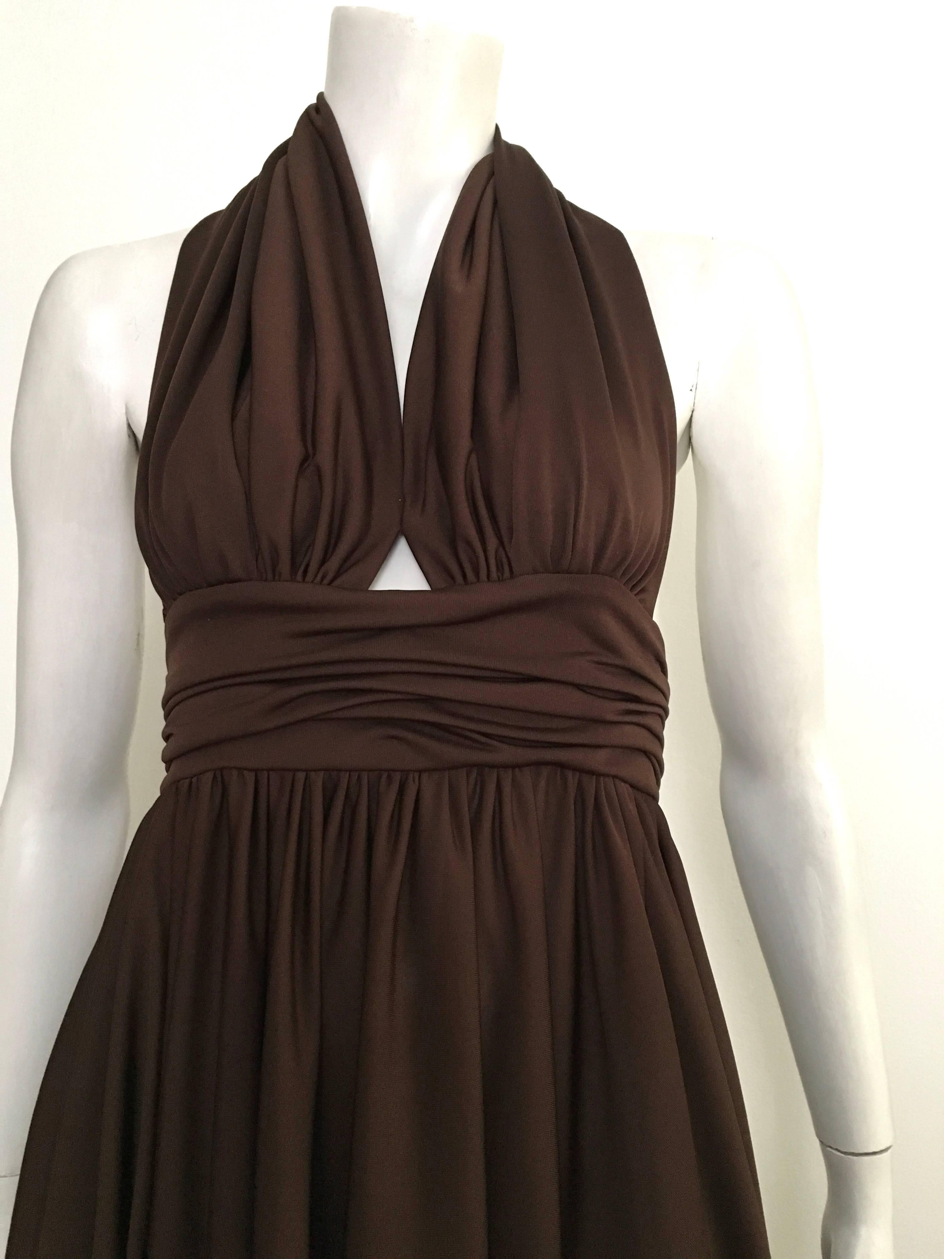 Frank Usher 1980s brown halter gown is a size 36 and fits like a USA size 4. Ladies if your body is the exact same as this size 4 mannequin this will fit to perfection. This is a red carpet gown worthy enough for Jessica Lange.  Gorgeous & elegant