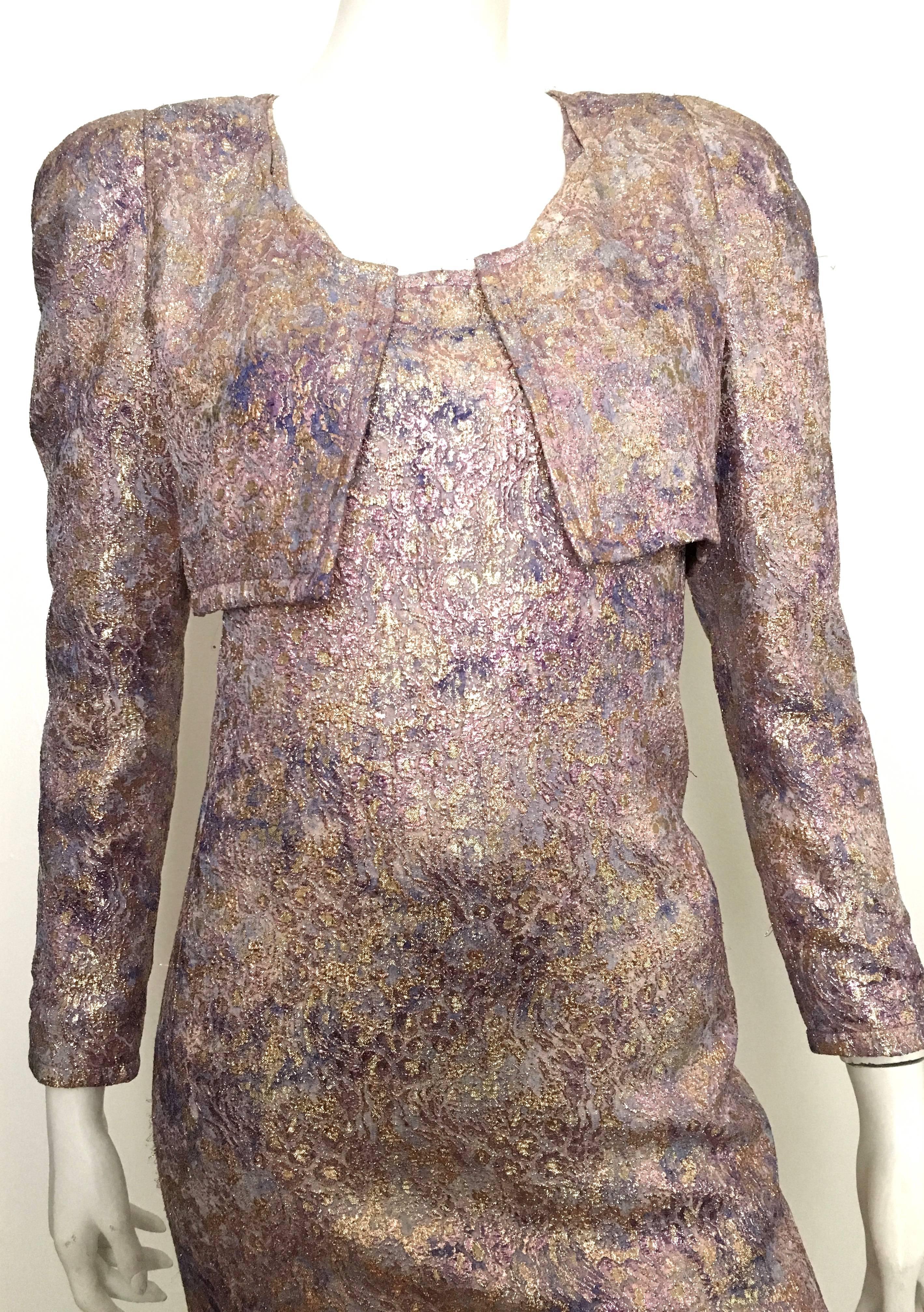 Carolina Herrera 1980s original sample holographic metallic lame evening cocktail dress with matching cropped jacket is a size 6.  Ladies please use your measuring tape so you can properly measure your bust, waist & hips to make certain this