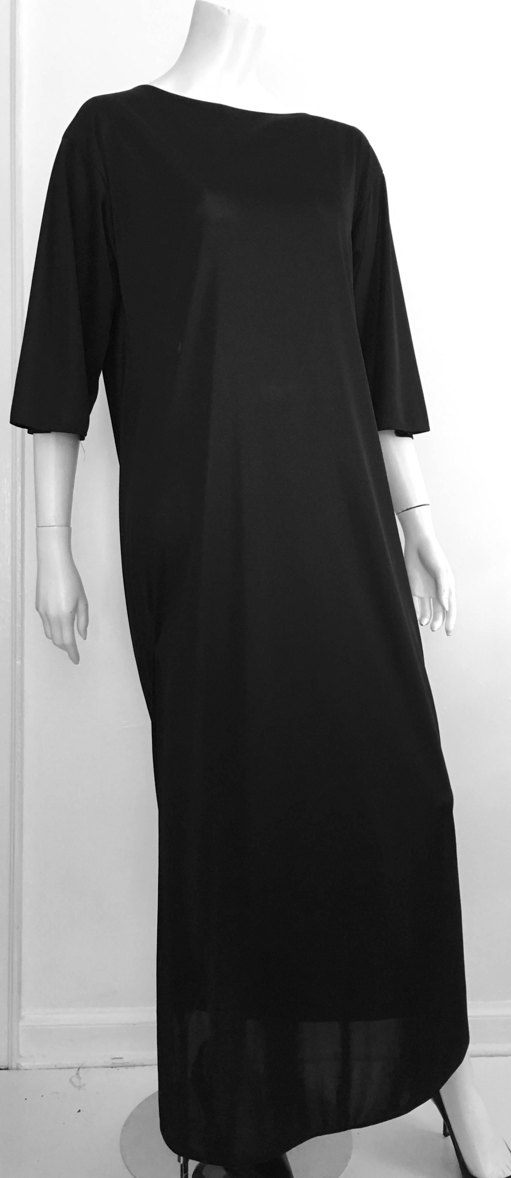 Bill Blass late 1970s museum worthy black long evening gown is a vintage size petite. The woman who owned this piece wears a size zero so this gown will fit a size 0, 2, 4 & 6. In all my years of being a vintage fashion dealer this Bill Blass gown