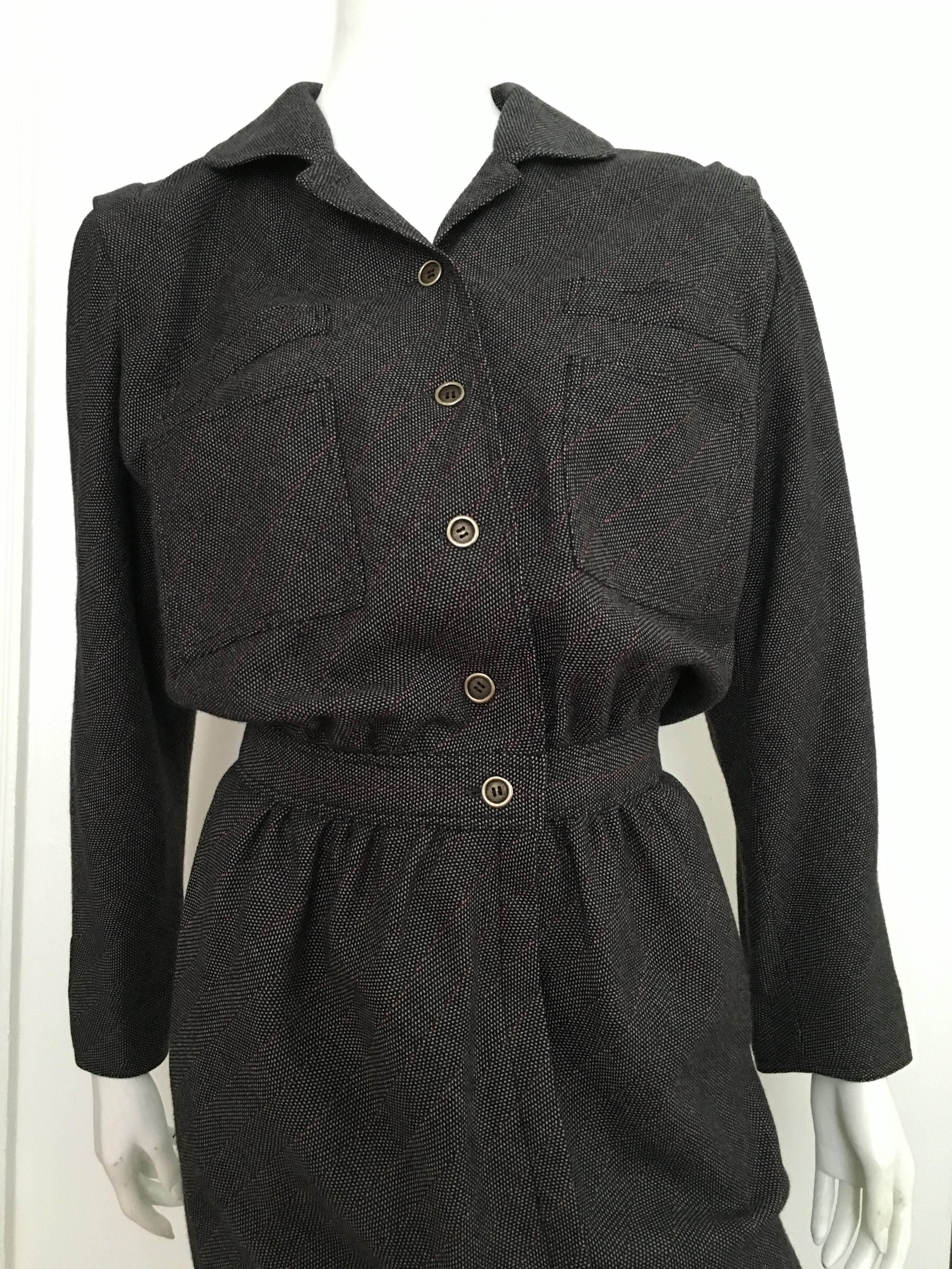Emanuel Ungaro Parallele Paris 1980s wool long sleeves partial button up dress with pockets is a vintage size 8 but fits like a modern size 4.  Ladies please use your measuring tape so you can properly measure your bust, waist & hips to make certain