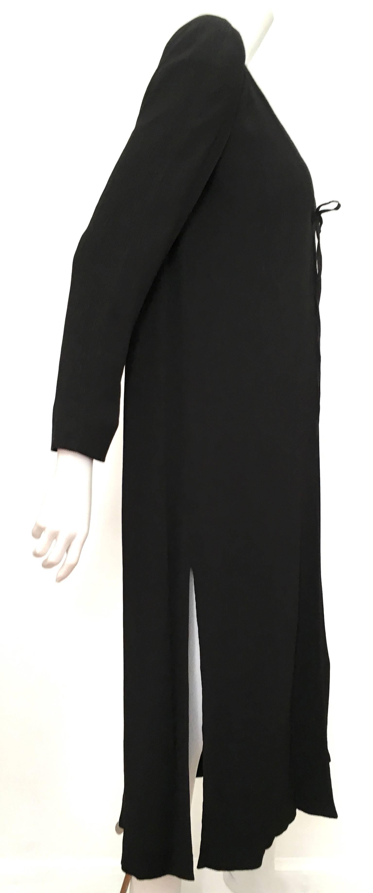 Fendi 1980s evening black textured silk tie string duster jacket is an Italian size 40 and a USA size 6.  Matilda the mannequin is a true size 4 and it fits her perfectly as well. Ladies please use your measuring tape so you can properly measure