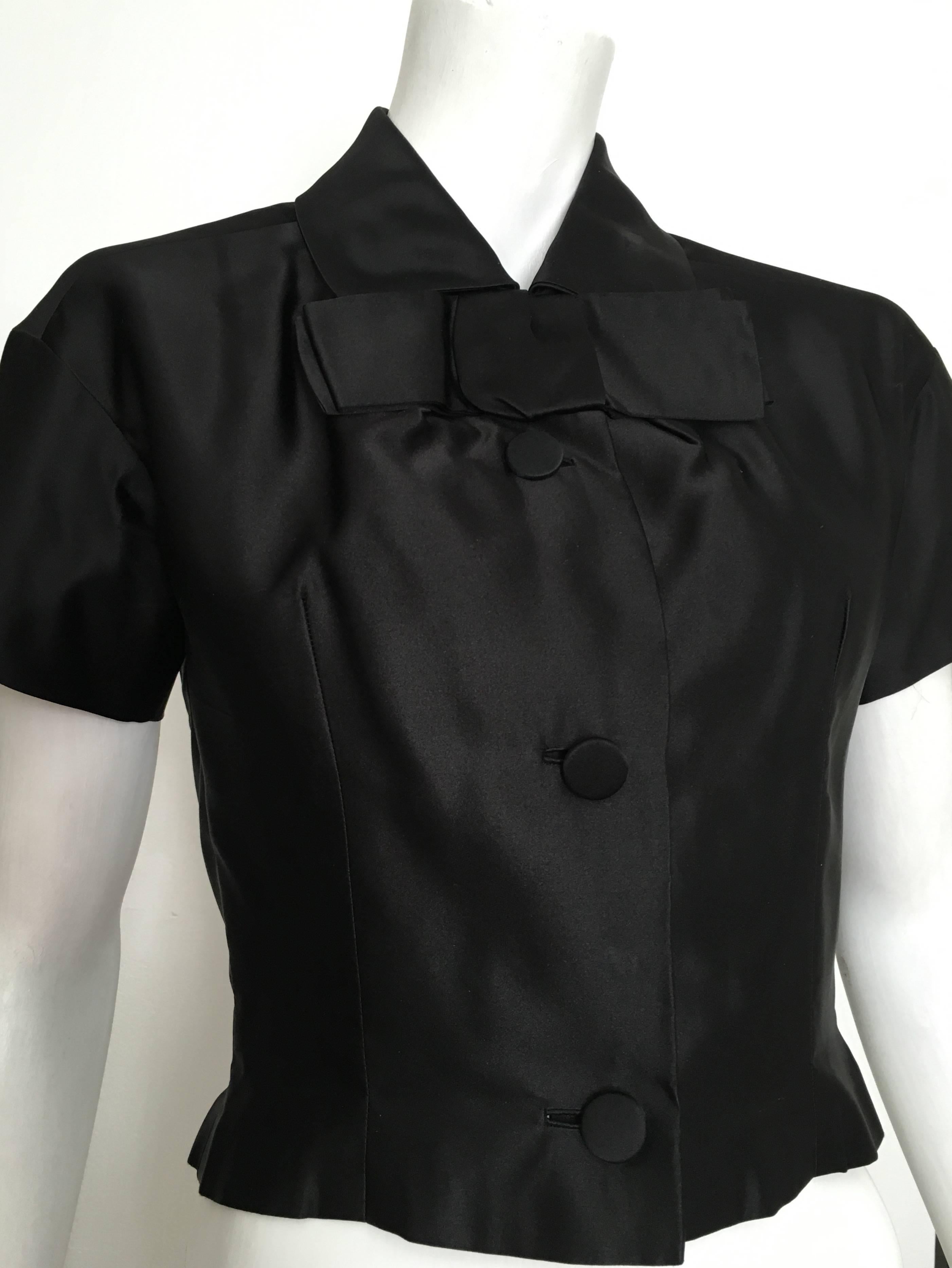 Christian Dior - New York 1950s black evening short sleeve silk blouse is a size 4. Ladies for this vintage treasure I urge you to please use your measuring tape so you can properly measure your bust & waist to make sure this will fit you the way