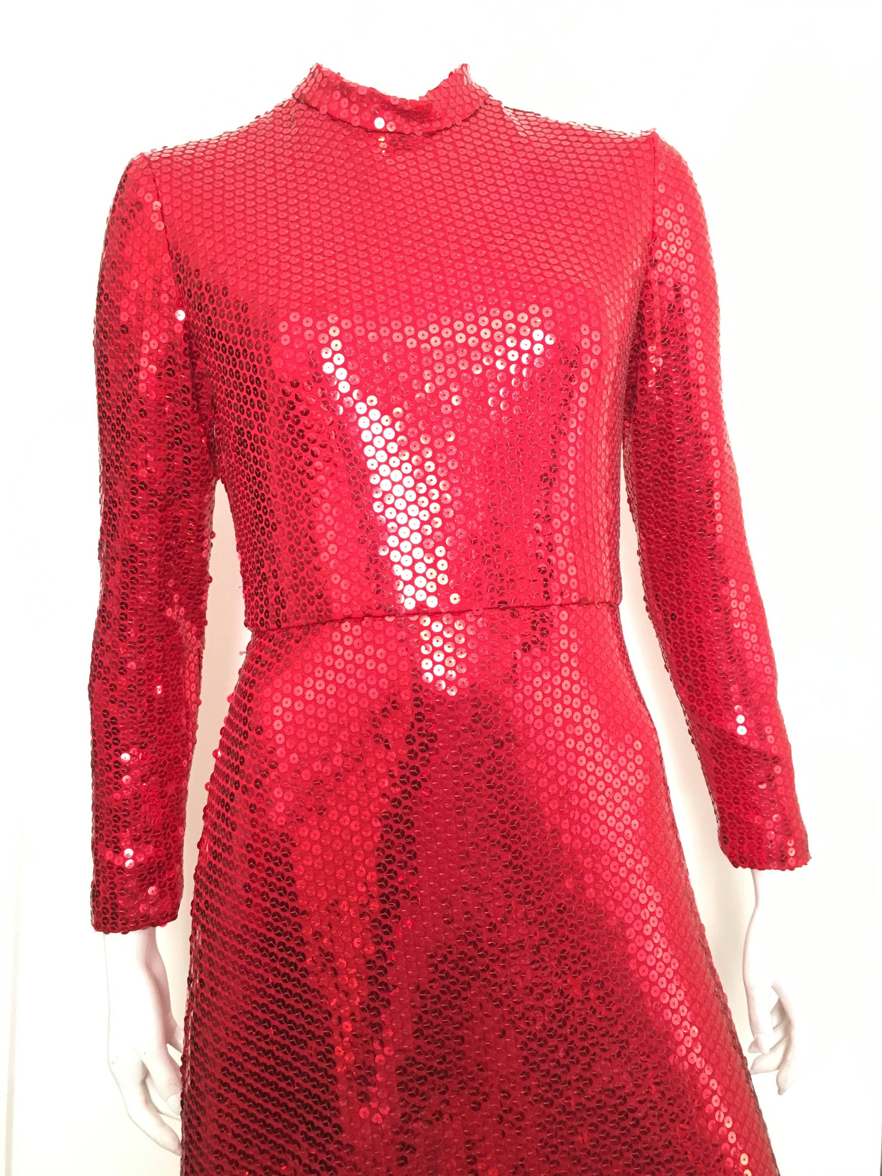 Neiman Marcus Silver Key 1980s red sequin gown is size 6.  Ladies please use your measuring tape so you can measure your bust, waist & hips to make certain this vintage treasure will fit your lovely body.  Gown is lined. 
This red sequin gown is