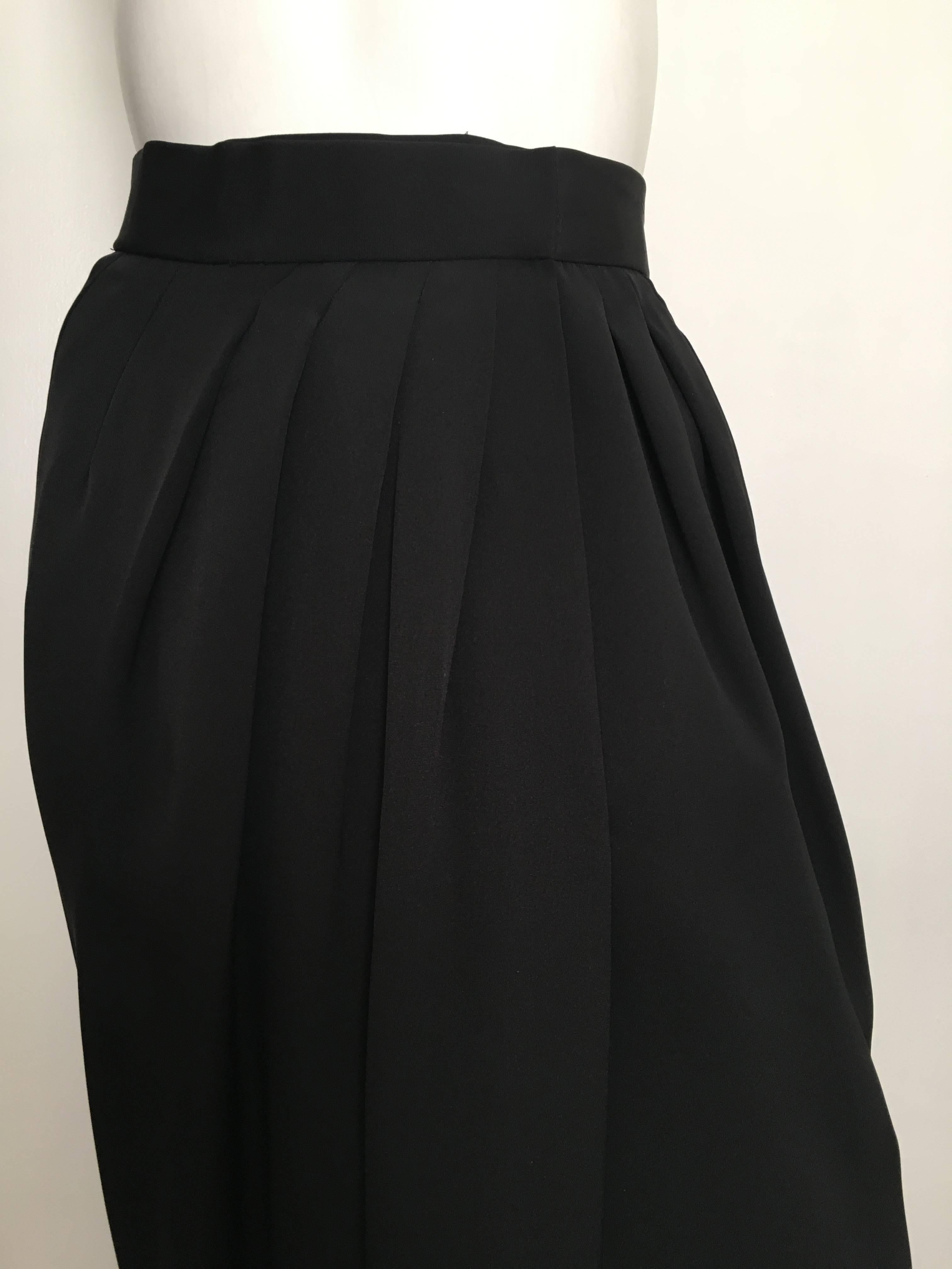 Carolyne Roehm 1980s long black evening wrap skirt is a vintage size 8 but fits like a modern USA size 4.  Ladies please use your measuring tape so you can properly measure your waistline to make certain this will fit you to perfection.  Classic &