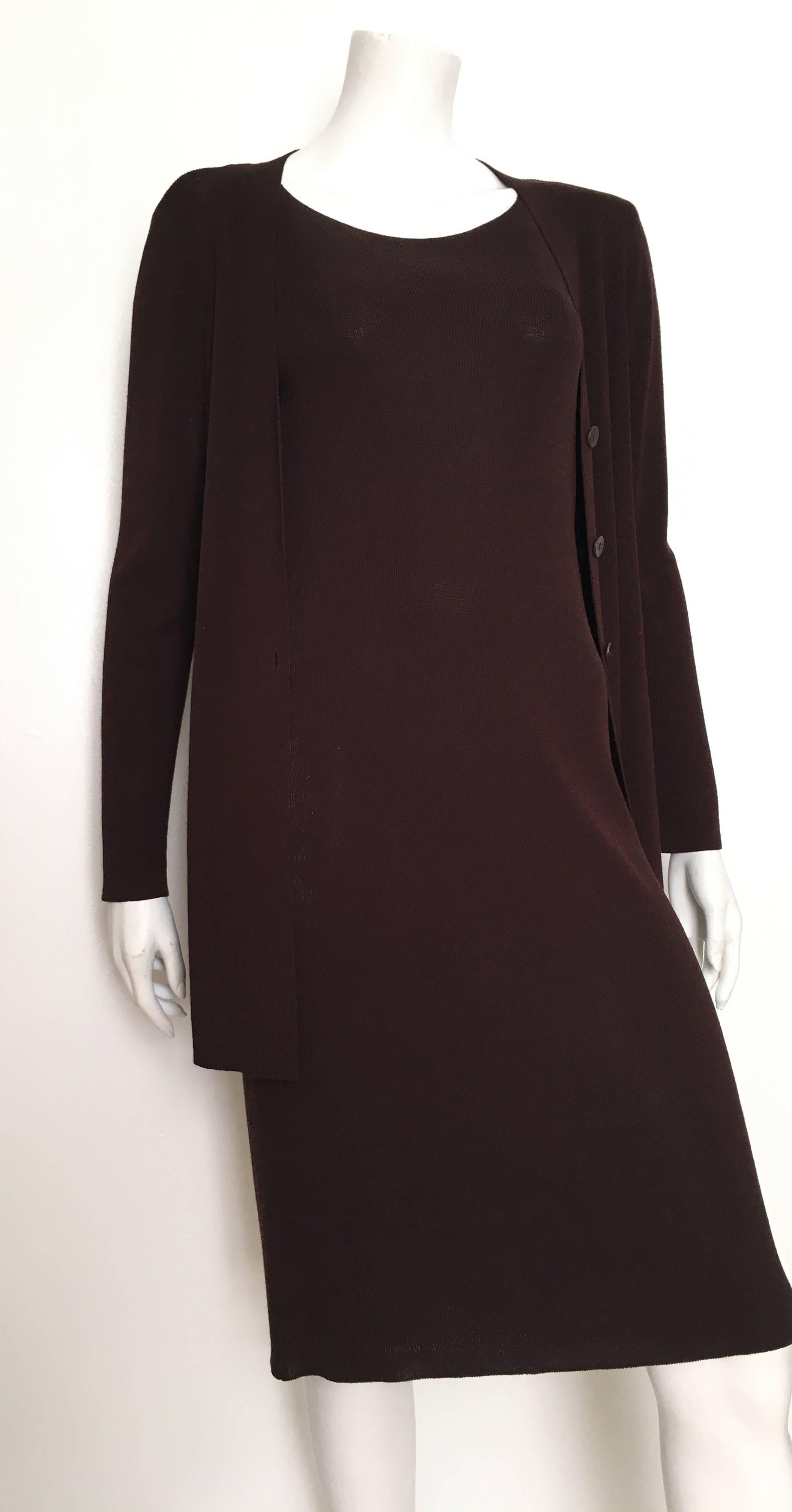 Saks Fifth Avenue 1990s dark chocolate brown knit sleeveless dress with matching long sleeve jacket is a size small that will fit a 4/6.  Ladies please grab your trusted measuring tape so you can properly measure your bust, waist & hips to make sure