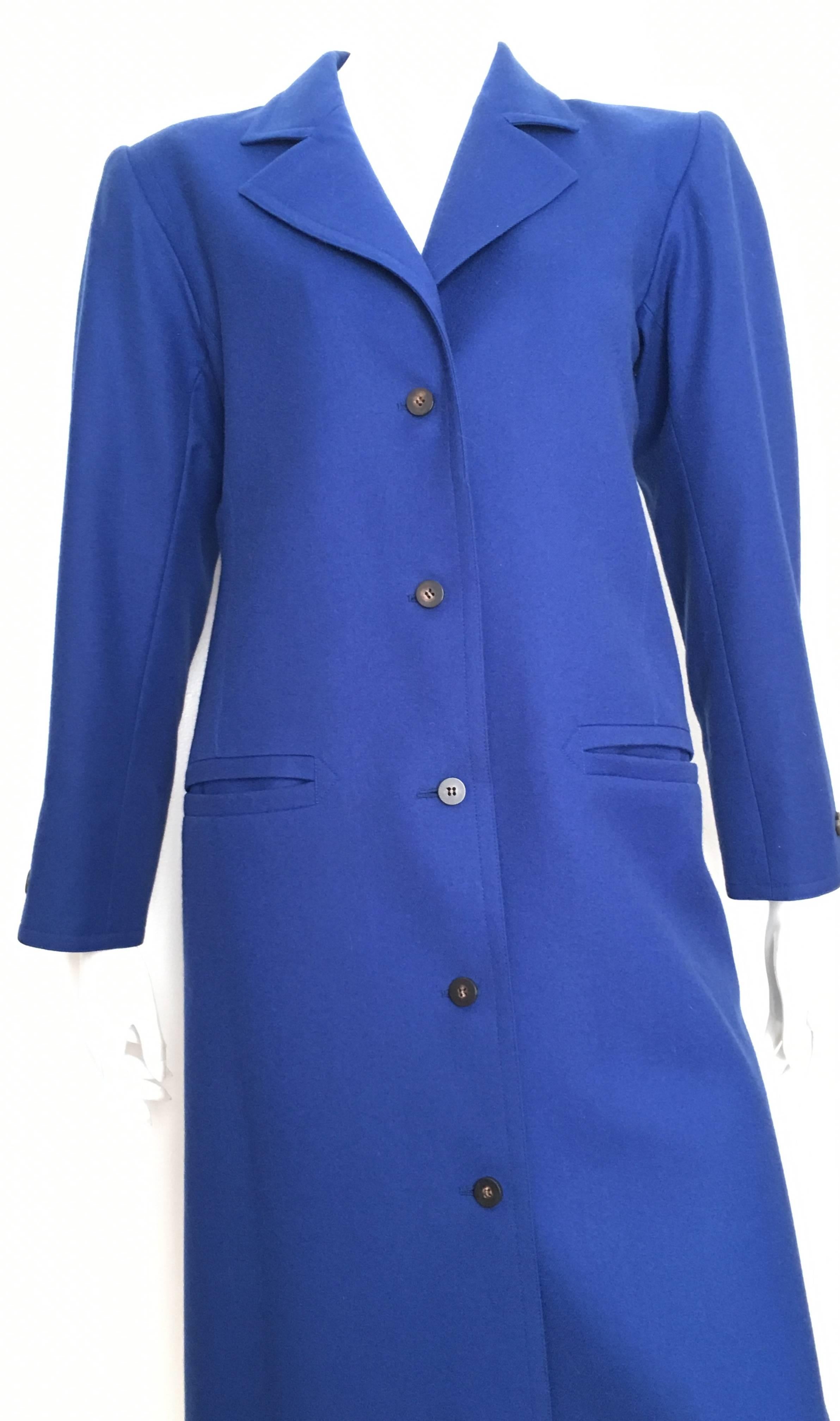 Yves Saint Laurent 1980s Yves Klein Blue wool coat is a size 8.  Ladies please pull out your trusted measuring tape so you can properly measure your bust, waist, hips & sleeves to make certain this will fit the way Laurent wanted it to.  This