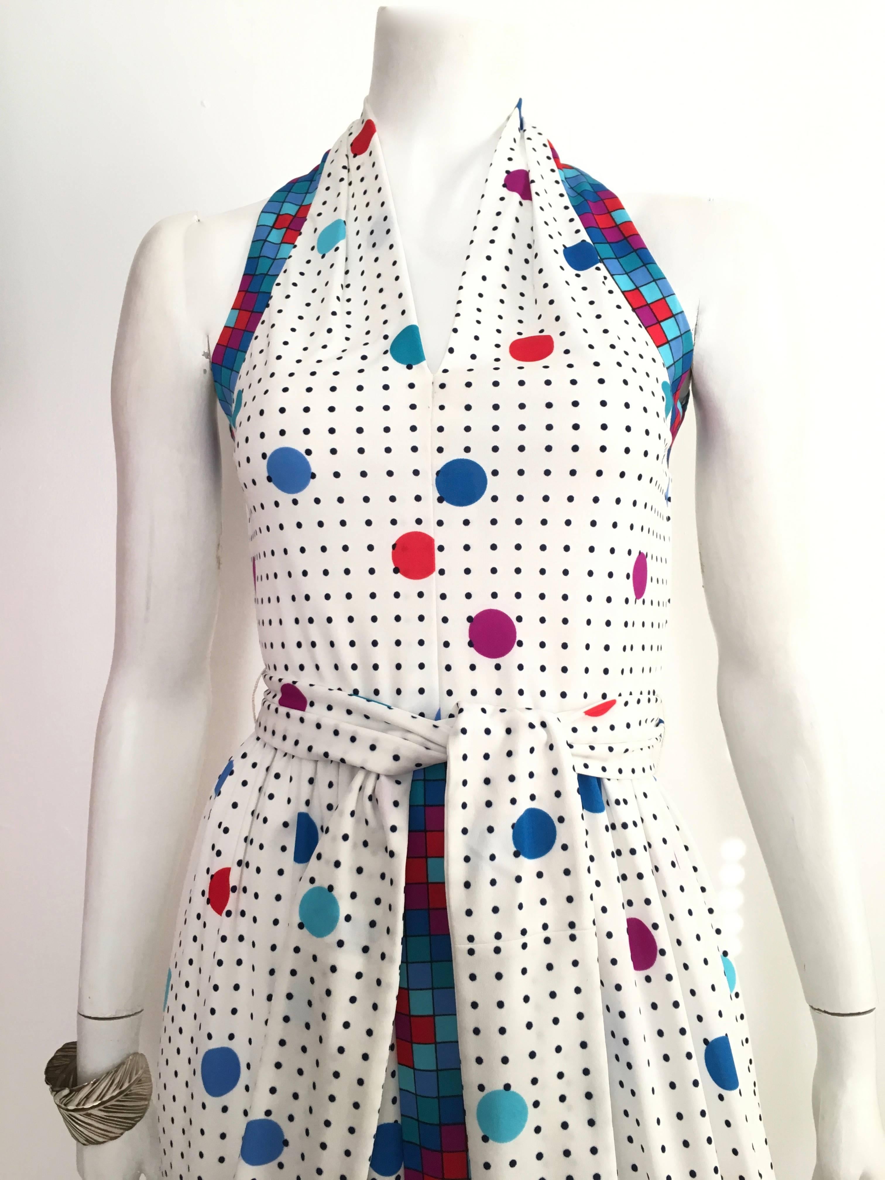 Anne Fogarty 1970s modern pop art design maxi sleeveless dress with belt is a vintage size 8 but fits like a modern USA size 4.  Ladies please grab your trusted measuring tape so you can properly measure your bust, waist & hips to make certain