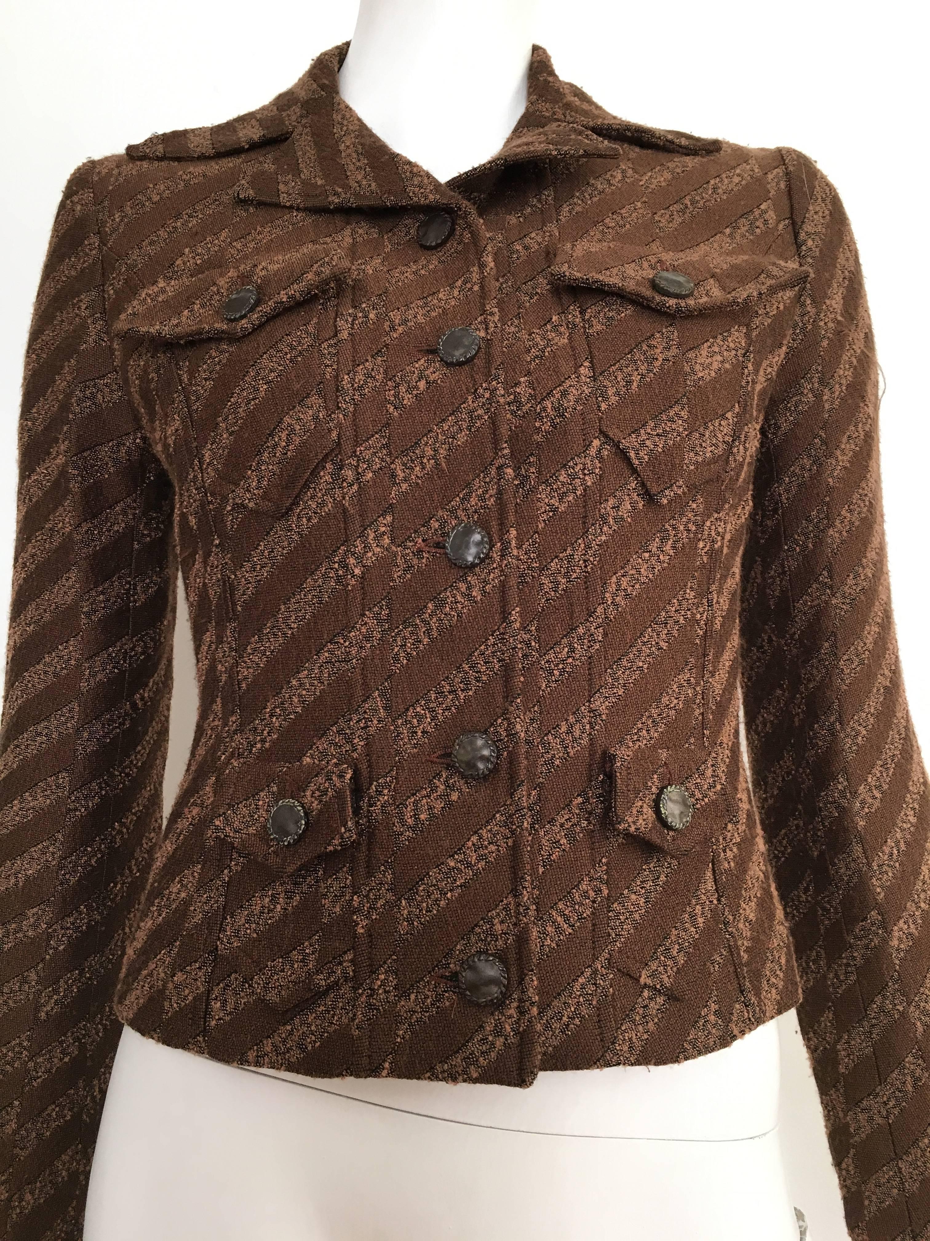 Christian Lacroix 1990s cropped brown jacket is a French size 34 and fits like an USA size 4.  Ladies please grab your tape measure so you can properly measure your bust-line to see if this piece will properly fit your lovely body.  It fits Matilda