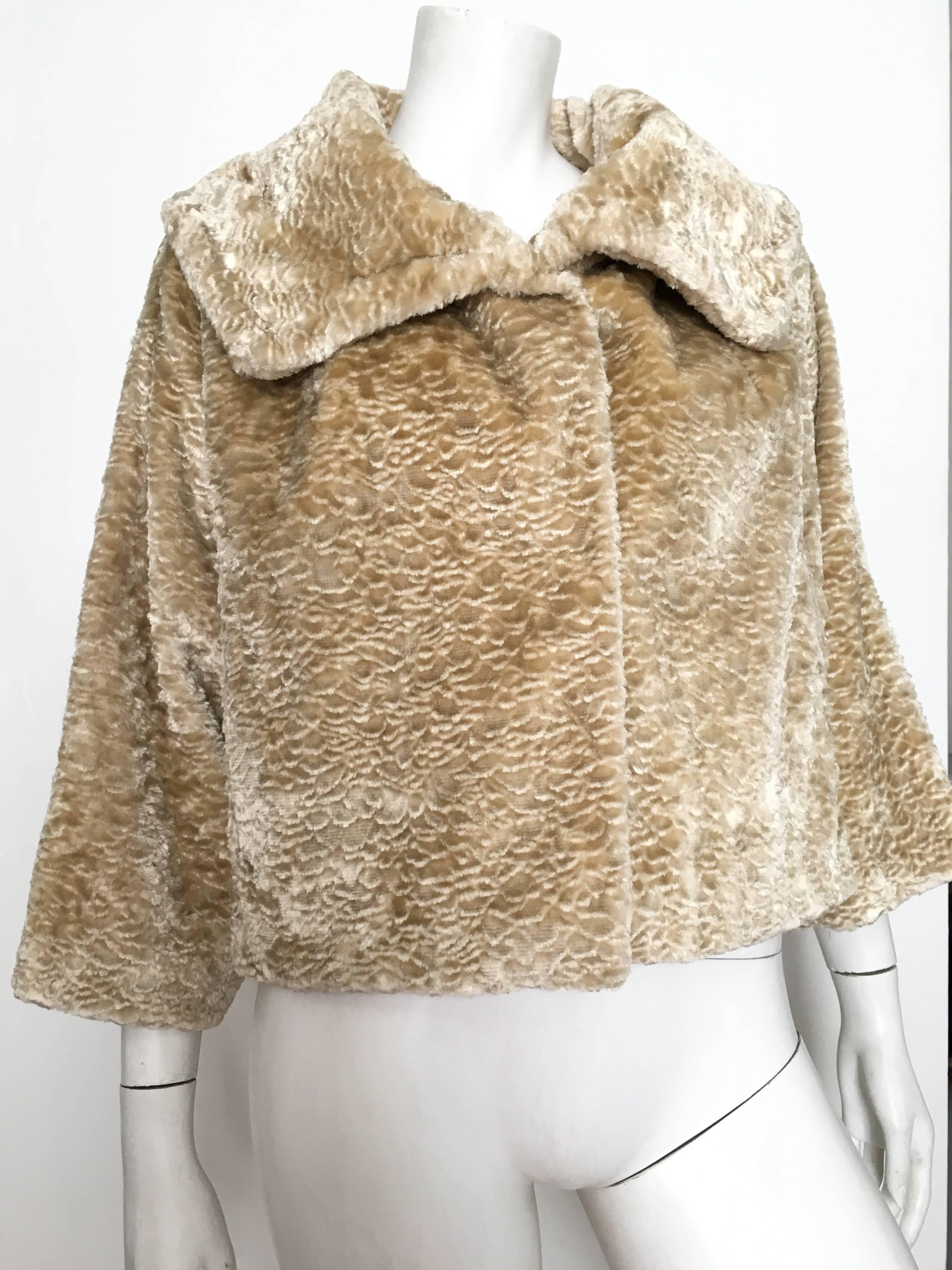 Bill Blass 1980s faux sand color fur jacket with wide collar is a size 8. Ladies you can wear this lovely vintage treasure with you classic Chanel little black dress and be the hit of the party. Gorgeous design and timeless.
Measurements are:
44'