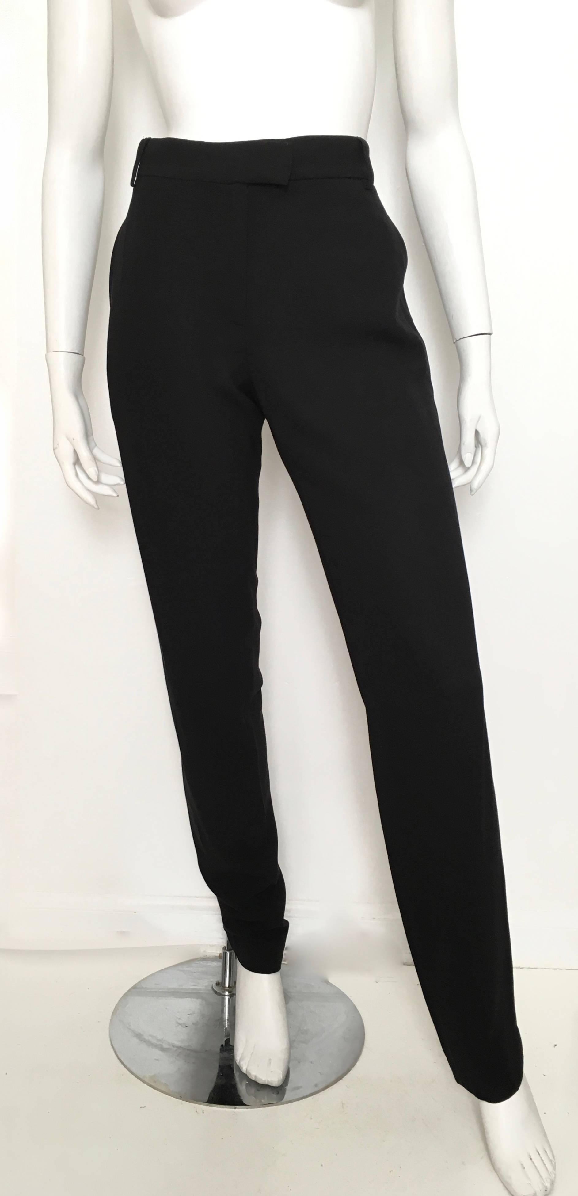Ann Demeulemeester black wool tuxedo "Eyes Closed Tight" beaded on the trim as shown in photo is a size 40 and fits like an USA size 8.  Ladies please use your tape measure so you can measure your waist-line to make certain these gorgeous