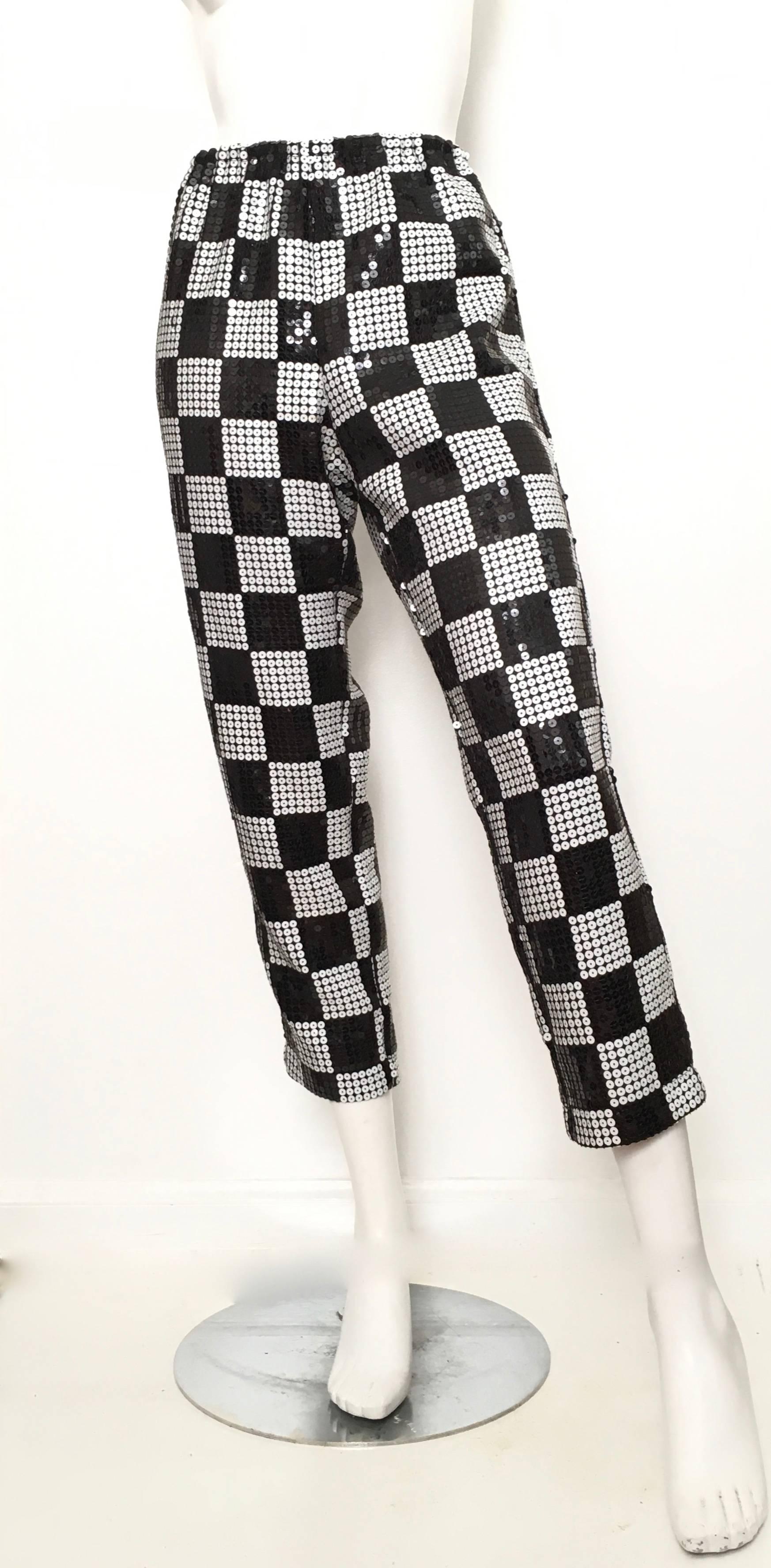 Comme des Garçons 1990, possibly 1999, black & white checker board pattern sequin pants are a size small and will fit an USA size 4 perfectly. Matilda the Mannequin is a size 4 and she is rocking them. Ladies please grab your trusted tape