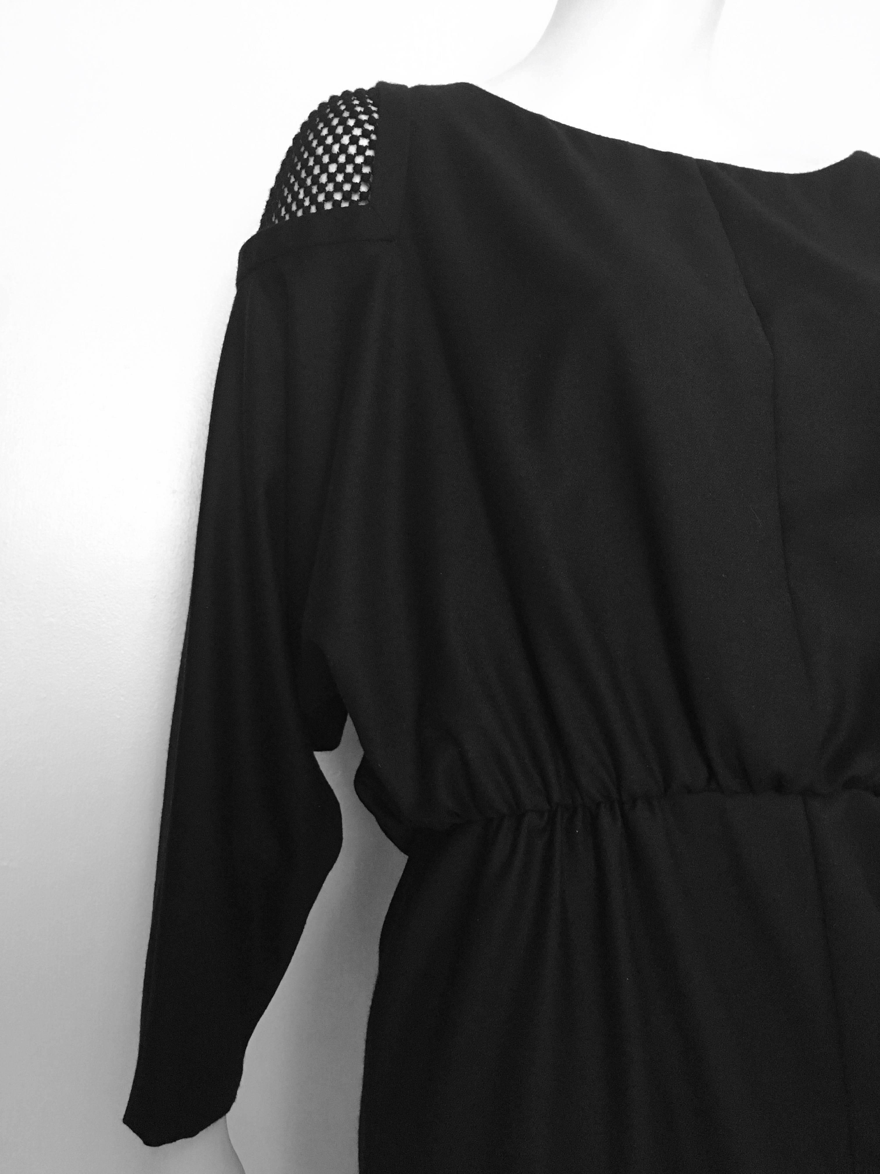 Viktor & Rolf stunning black wool evening cocktail dress with dolman sleeves is an Italian size 44 or an USA size 8.  Ladies please grab your trusted measuring tape so you can properly measure your bust, waist & hips to make certain this will fit