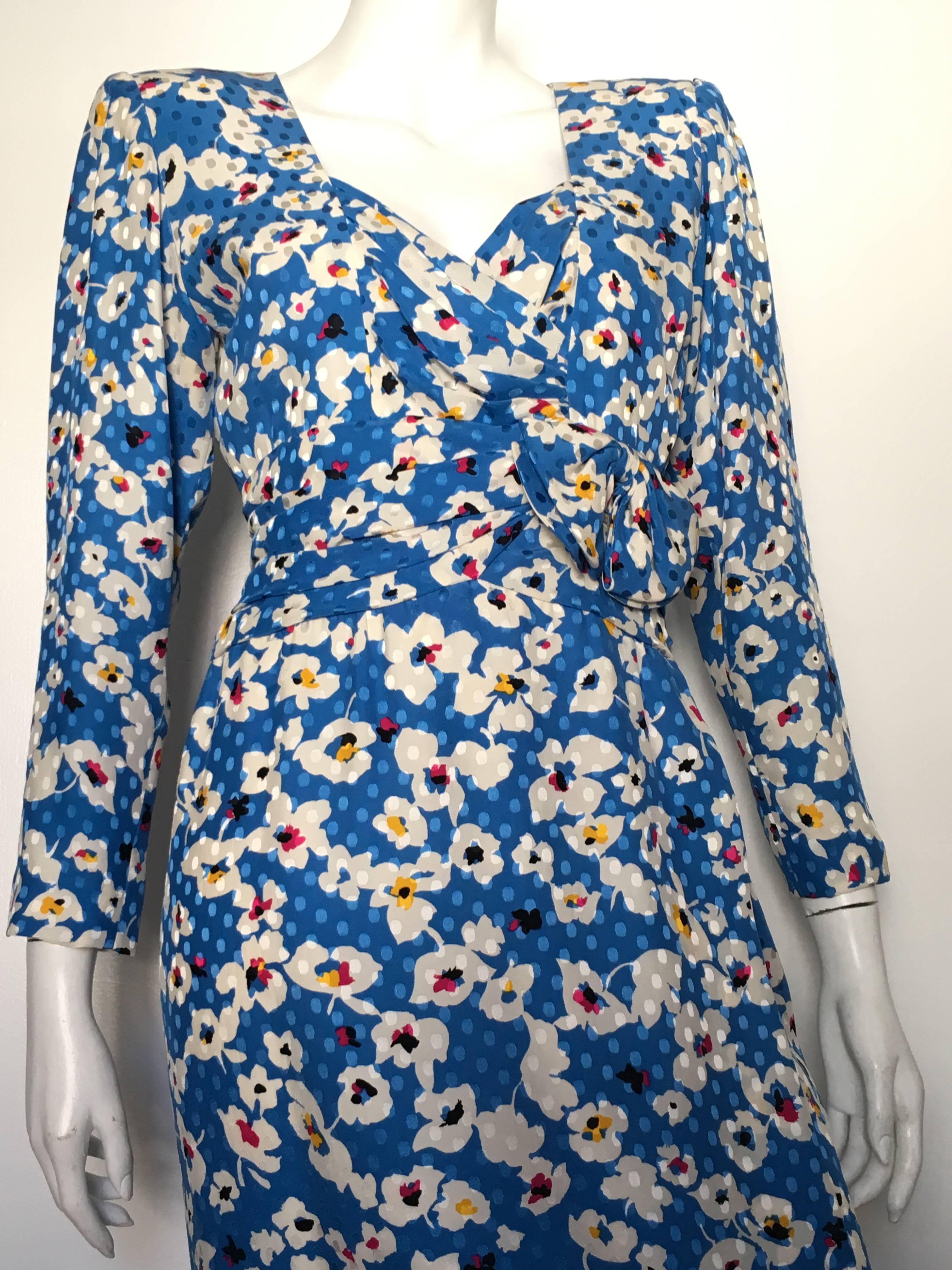 Nina Ricci 1980s silk floral sheath dress is a vintage French size 40 and fits like an USA size 4/6.  Ladies please grab your trusted tape measure so you can properly measure your bust, waist & hips to make certain this will fit your lovely body. 