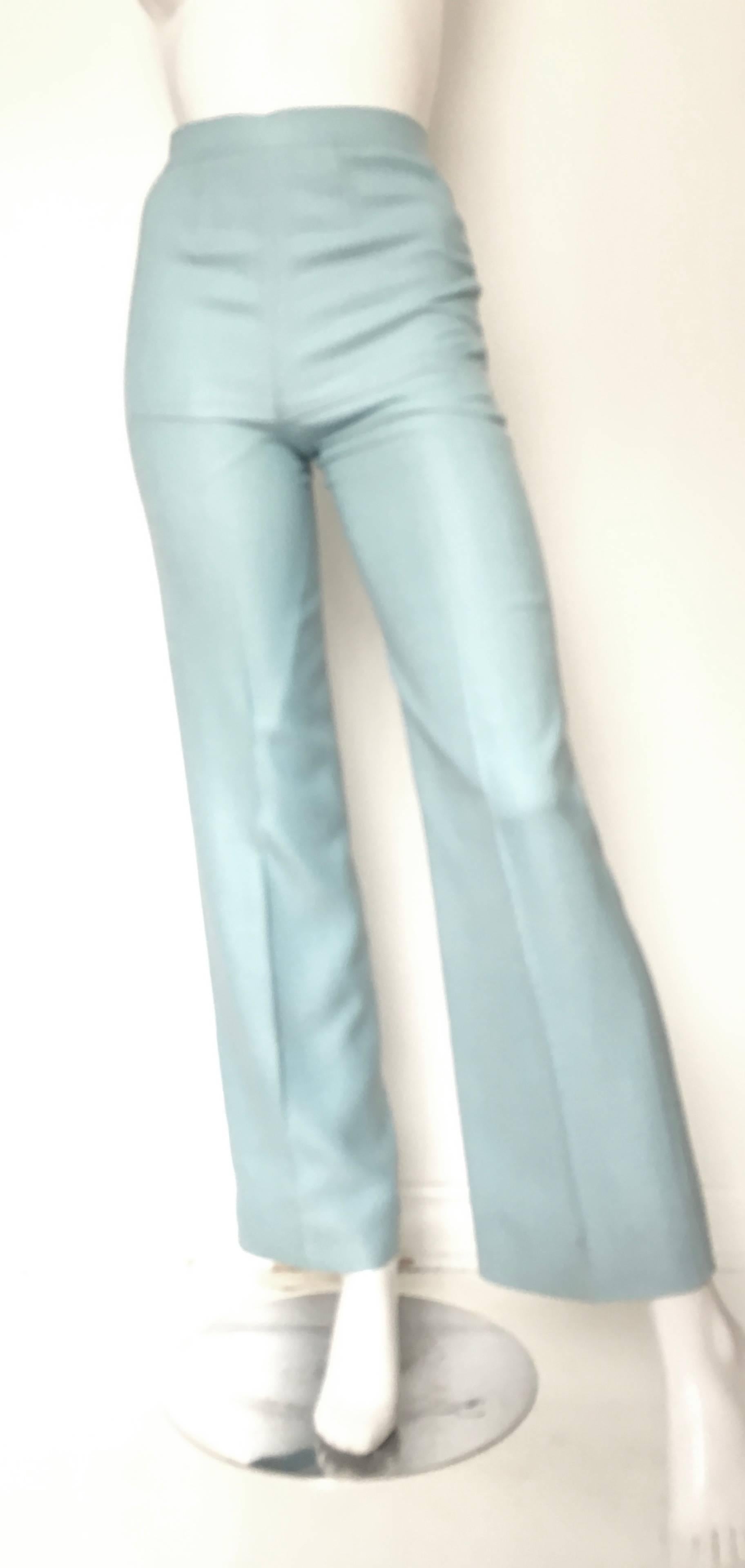 Courreges Paris 1970s stunning aqua pants is an USA size x-small.  Ladies please grab your trusted tape measure so you can properly measure your waistline & inseam to make certain these gorgeous pants will fit you to perfection.  Texture wise these