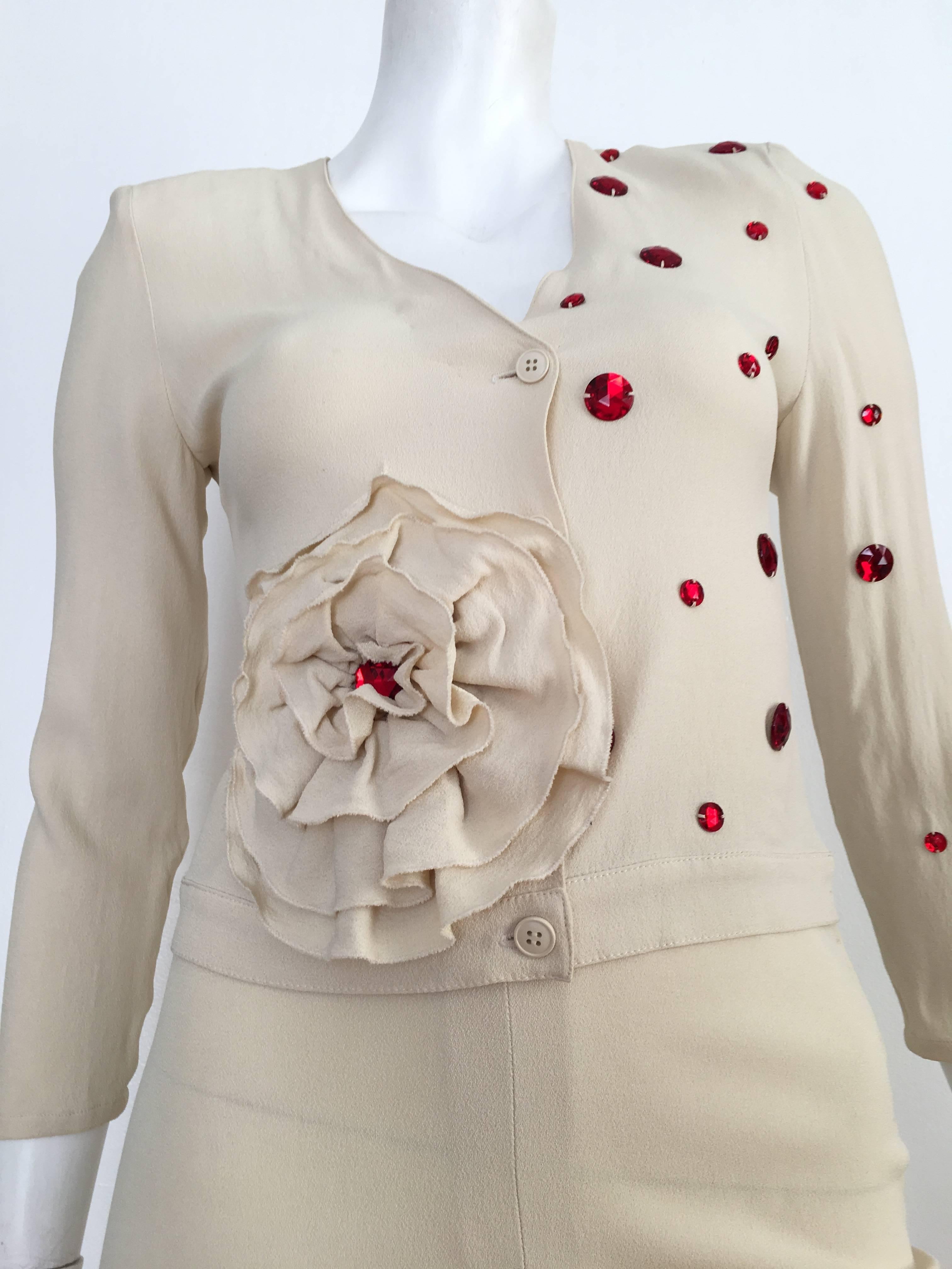 Sonia Rykiel 1980s cream jacket & skirt with red rhinestones is a size 4.  Ladies please grab your trusted tape measure so you can measure your bust, waist & hips to make certain this treasure will fit you the way Sonia wanted it to, may she