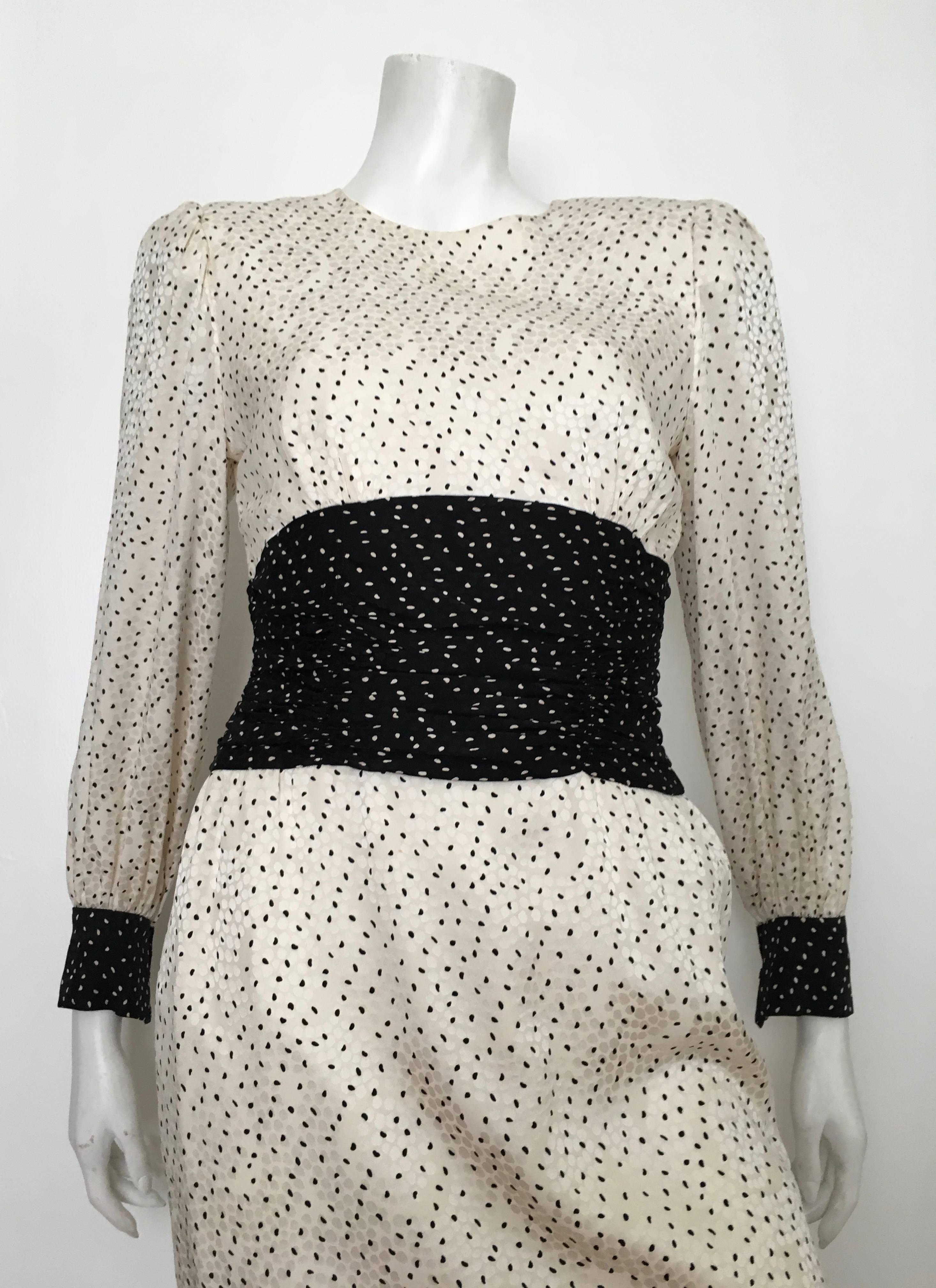 Carolina Herrera for Neiman Marcus 1980s cream & black silk dress is a size 6.  Ladies please grab your trusted tape measure so you can properly measure your bust, waist & hips to make certain this will fit you the way Carolina wanted it to.