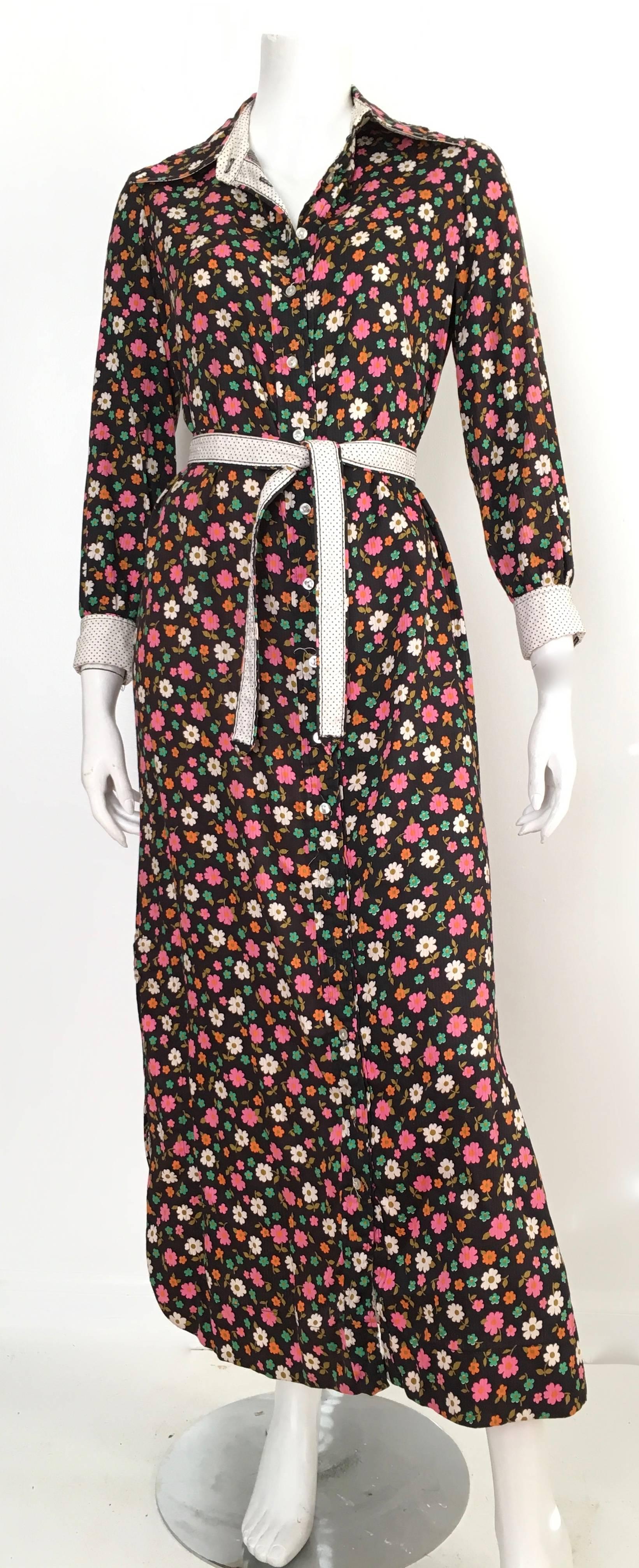Geoffrey Beene 1960s cotton floral pattern button up dress with belt is a vintage size 14 and fits like a modern USA size 8.  Ladies please grab your trusted tape measure so you can properly measure your bust, waist & hips to make certain this will
