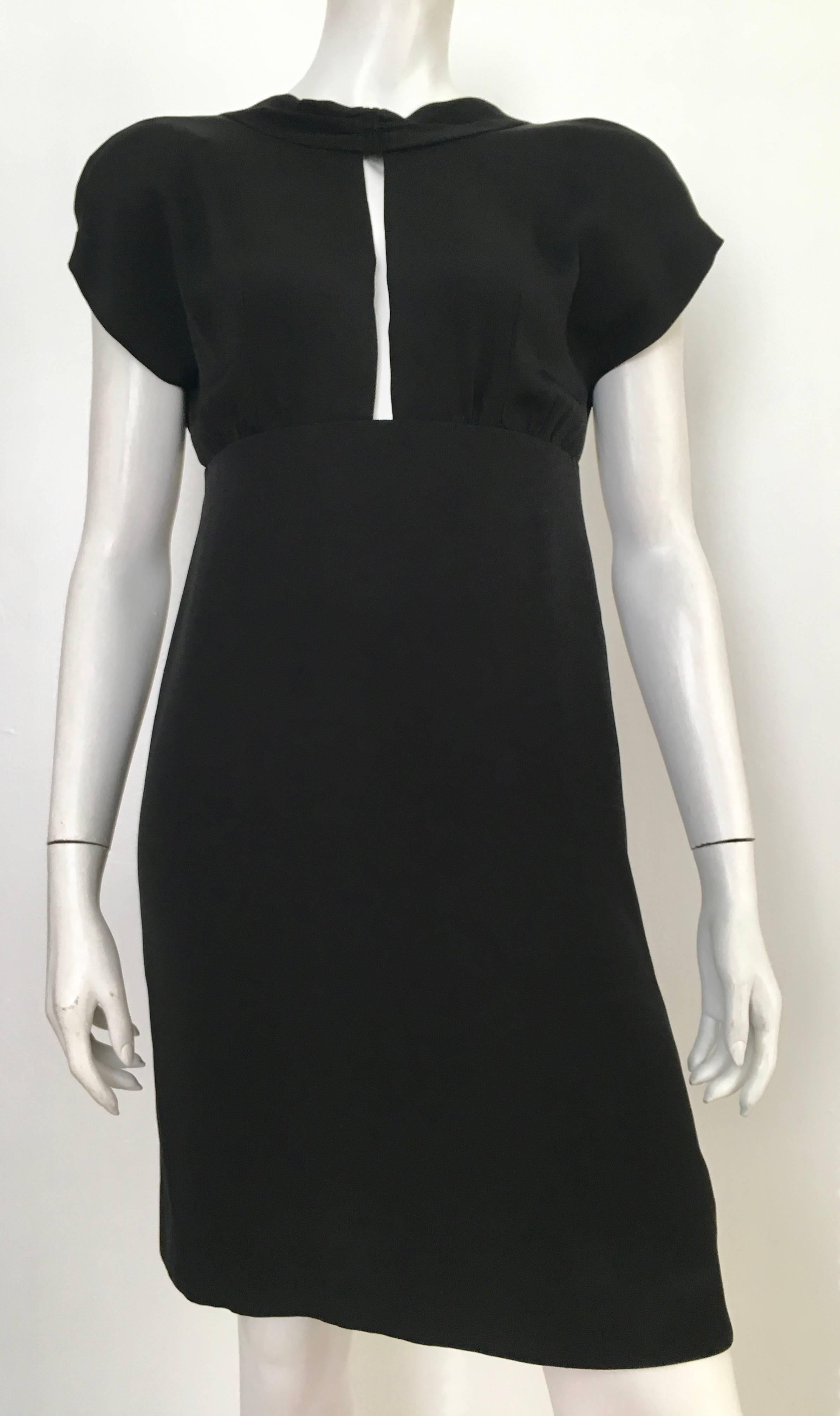 Adele Simpson 1980s sexy little black silk dress is a size 8 but fits like a modern USA size 6.  Ladies please grab your trusted tape measure so you can measure your bust, waist & hips to make certain this vintage treasure will fit your lovely body.