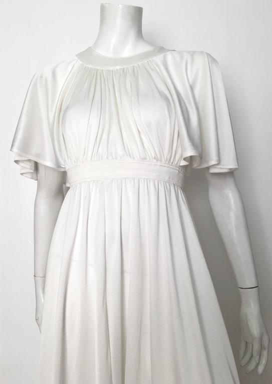 Pierre Cardin 1970s White Jersey Empire Waist Dress with Pockets Size 4. For Sale at 1stdibs