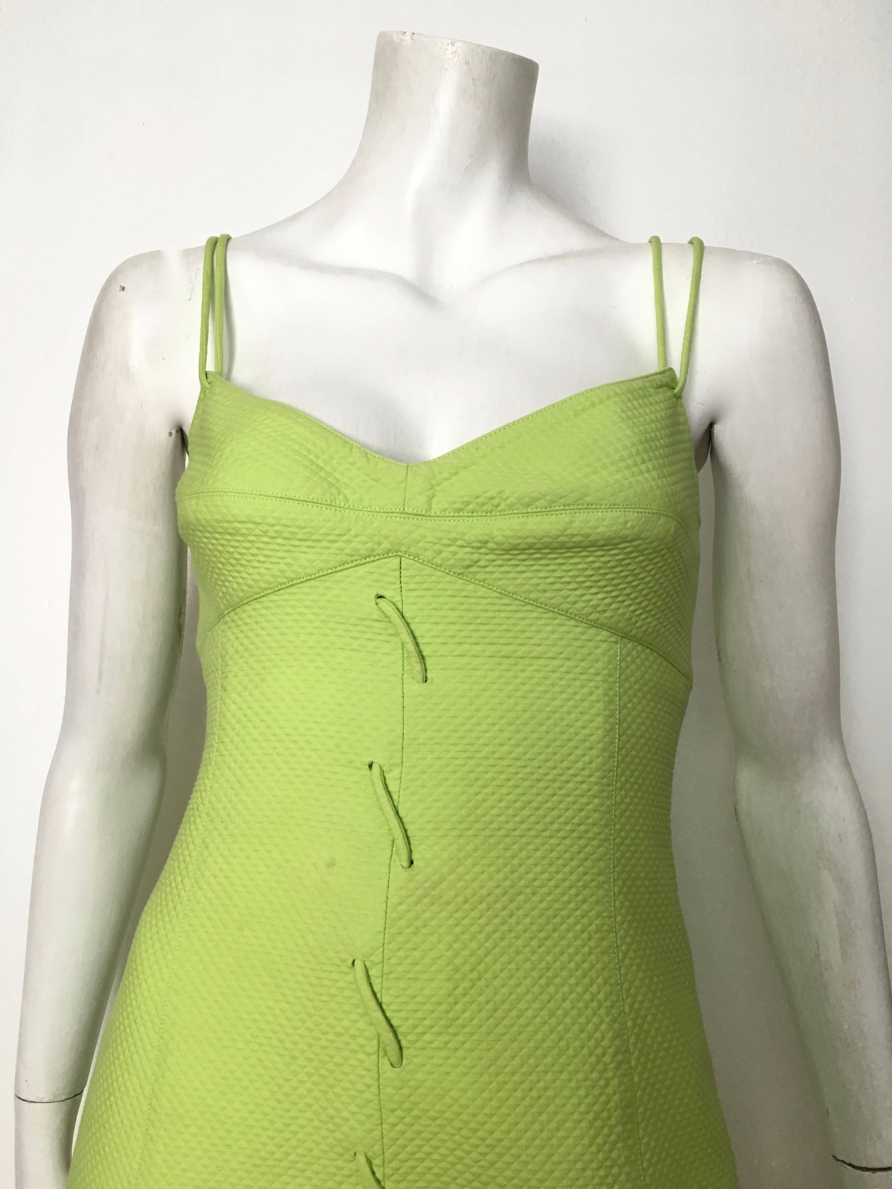 Genny 1990s neon green cotton spaghetti strap sexy wiggle dress is a size 8 but fits like a modern USA size 6.  Ladies please grab your trusted tape measure so you can measure your bust, waist & hips to make certain this gorgeous dress will fit your