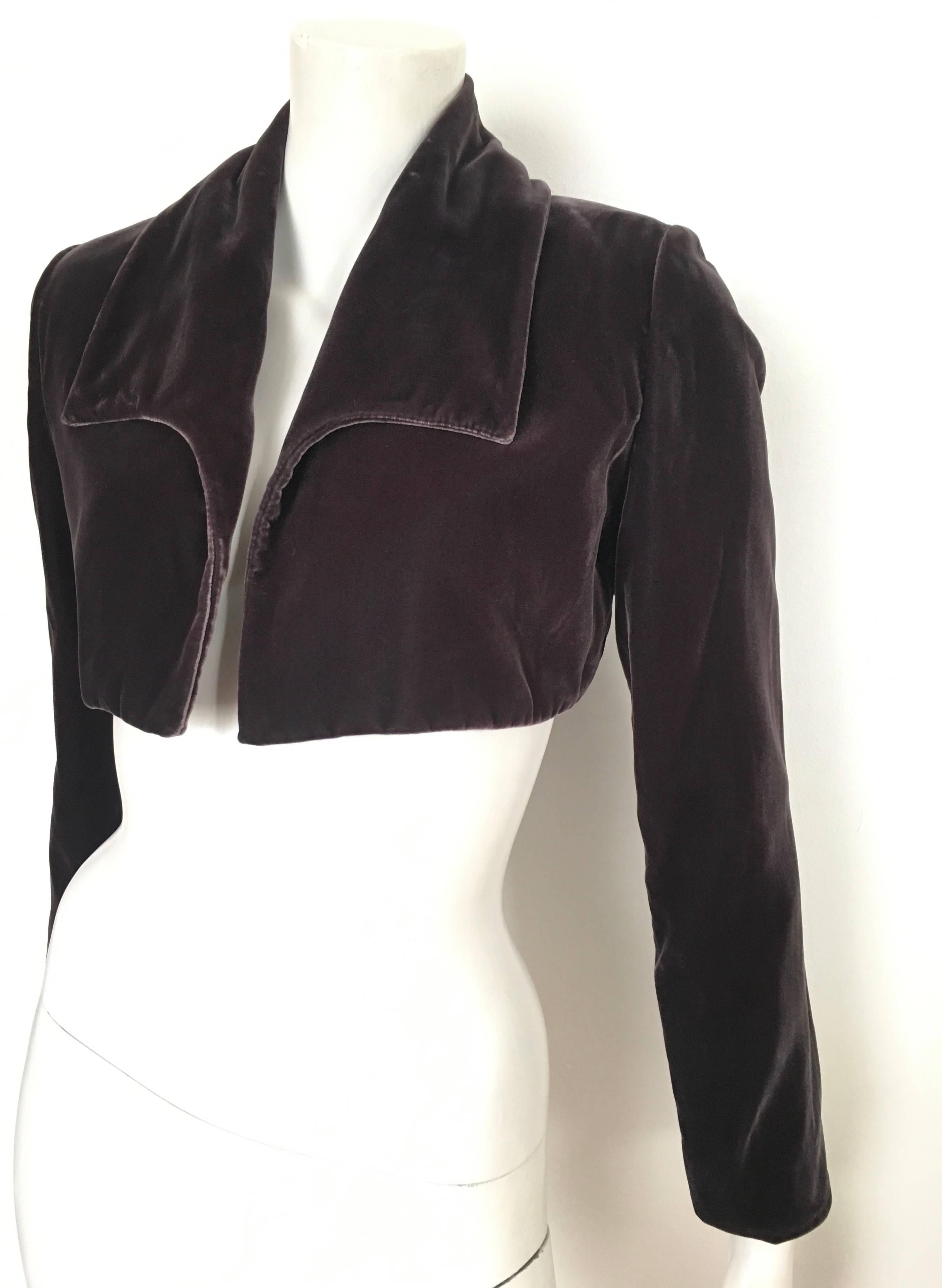 Donald Deal for Neiman Marcus 1990s cropped eggplant color silk velvet cropped jacket is an USA size 6. Ladies please grab your trusted tape measure so you can properly measure your bust & arm length to make certain this gorgeous velvet cropped