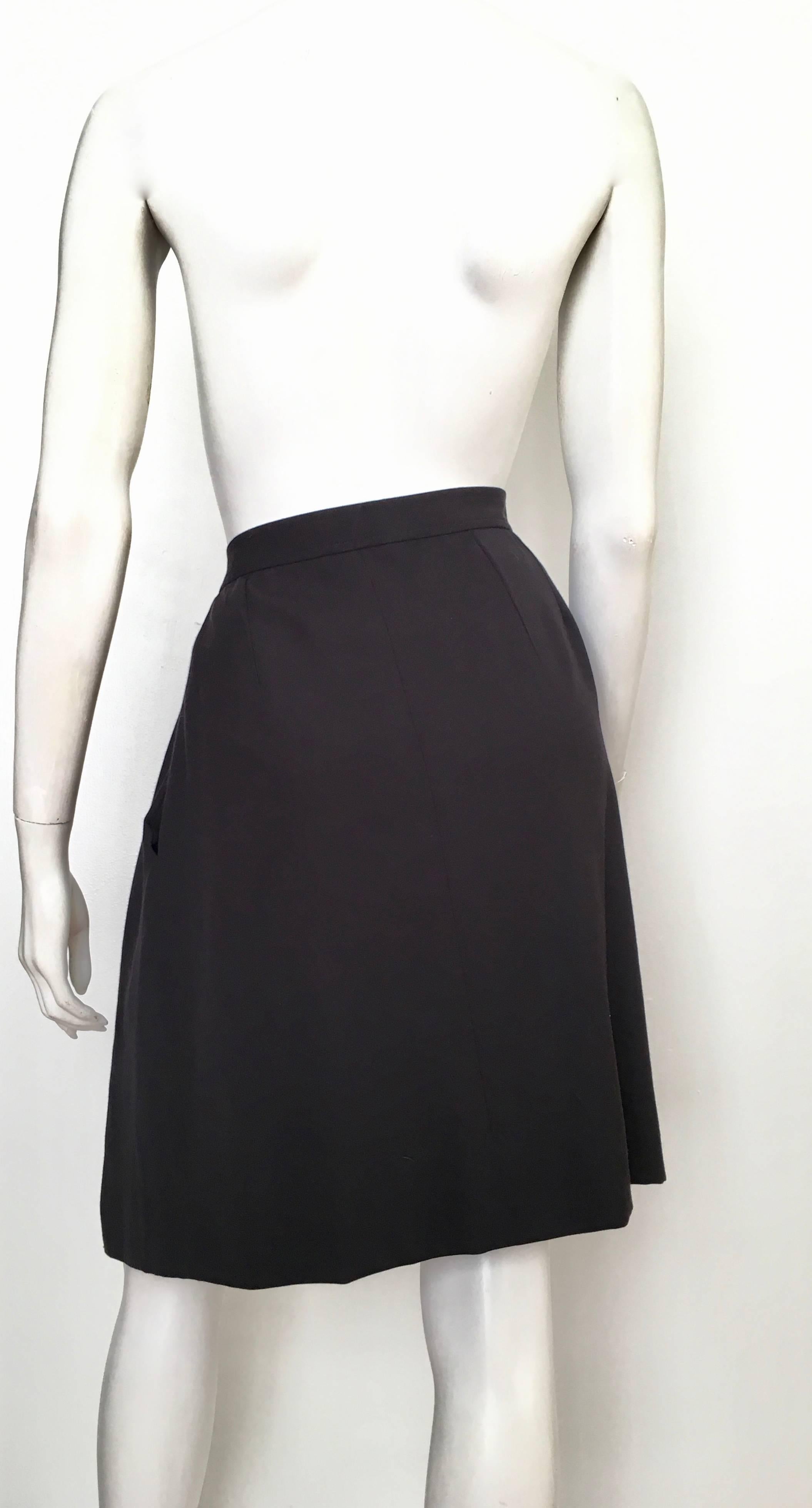 Women's or Men's Yves Saint Laurent 1990s Black Wool Wrap Skirt with Pockets Size 6 / 8. For Sale